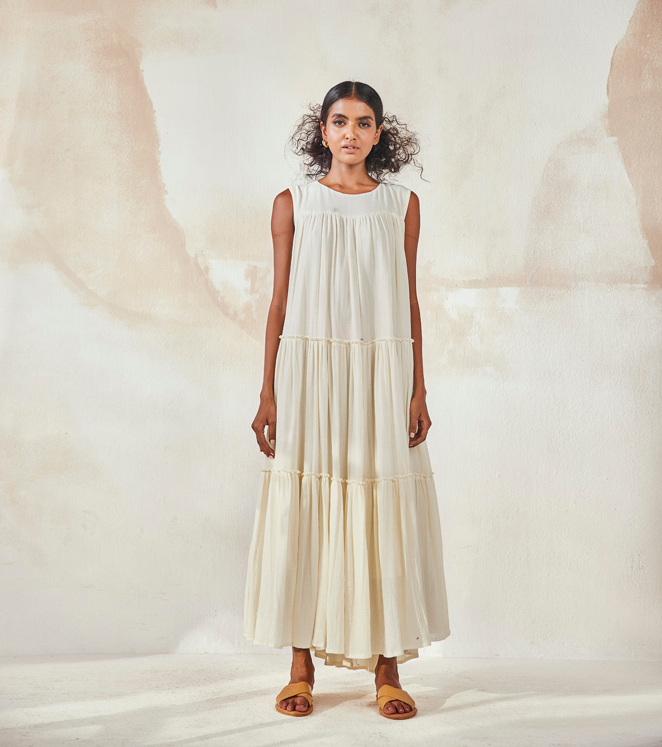 White Lily Bouque at Kamakhyaa by Khara Kapas. This item is Cotton, Endless Summer, Natural, Regular Fit, Resort Wear, Sleeveless Dresses, Solids, Tiered Dresses, White, Womenswear