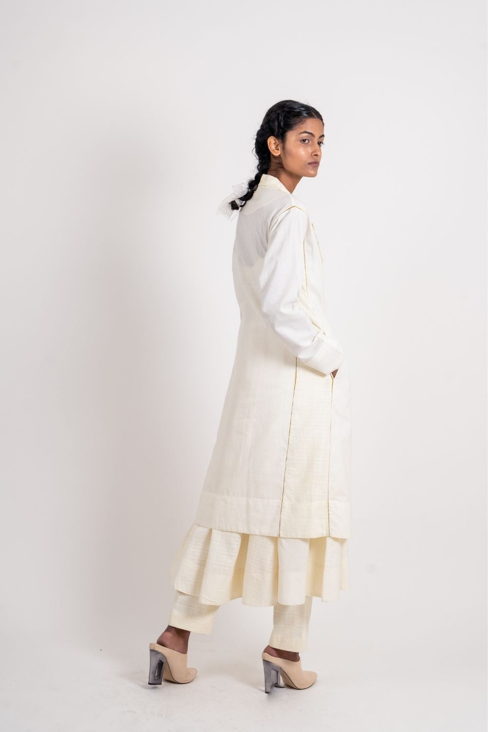 White Long Jacket at Kamakhyaa by Ahmev. This item is Casual Wear, Coats, Handloom Cotton, July Sale, July Sale 2023, Natural, Overlays, Regular Fit, Solids, White, Womenswear