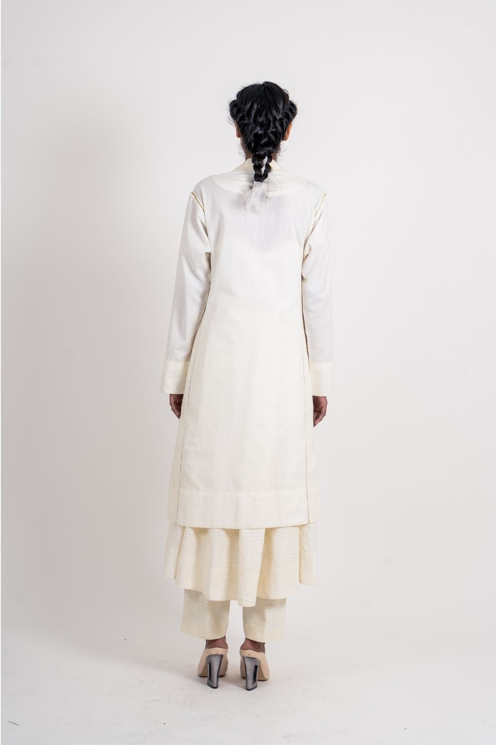 White Long Jacket at Kamakhyaa by Ahmev. This item is Casual Wear, Coats, Handloom Cotton, July Sale, July Sale 2023, Natural, Overlays, Regular Fit, Solids, White, Womenswear
