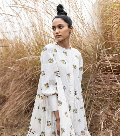 White Mini Dress- Print at Kamakhyaa by Khara Kapas. This item is Lost & Found, Mini Dresses, Mulmul, Natural, Prints, Resort Wear, Shirt Dresses, Tiered Dresses, White, Womenswear