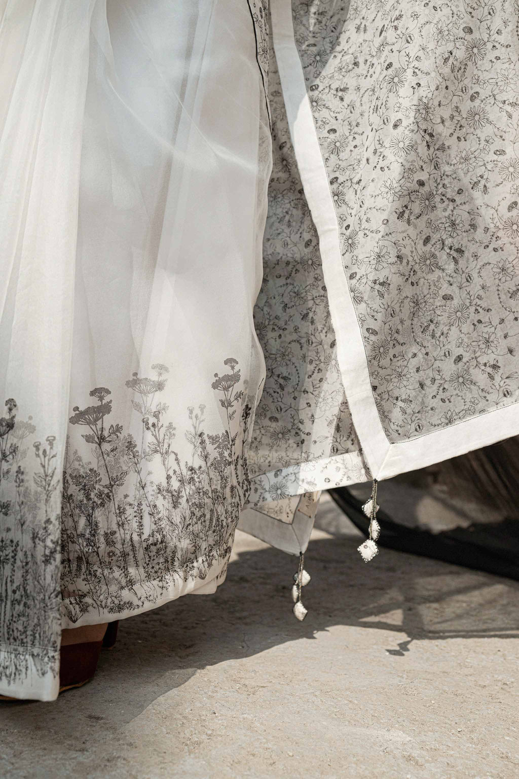 White Organza Saree at Kamakhyaa by Ahmev. This item is Casual Wear, For Mother, Free Size, Indian Wear, Ink And Ivory, Natural, Prints, Sarees, Silk Organza, White, Womenswear