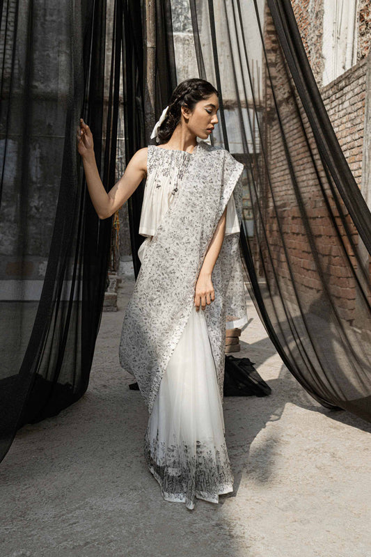 White Organza Saree at Kamakhyaa by Ahmev. This item is Casual Wear, For Mother, Free Size, Indian Wear, Ink And Ivory, Natural, Prints, Sarees, Silk Organza, White, Womenswear