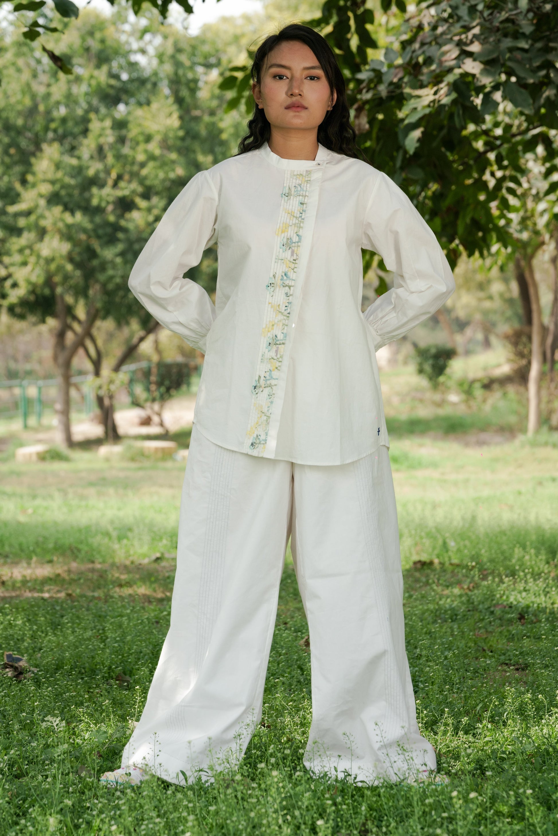 White Pleated placket shirt at Kamakhyaa by Ahmev. This item is Batik, Casual Wear, Cotton, Handpainted, July Sale, July Sale 2023, Natural, Prints, Regular Fit, Shirts, Tops, White, Womenswear