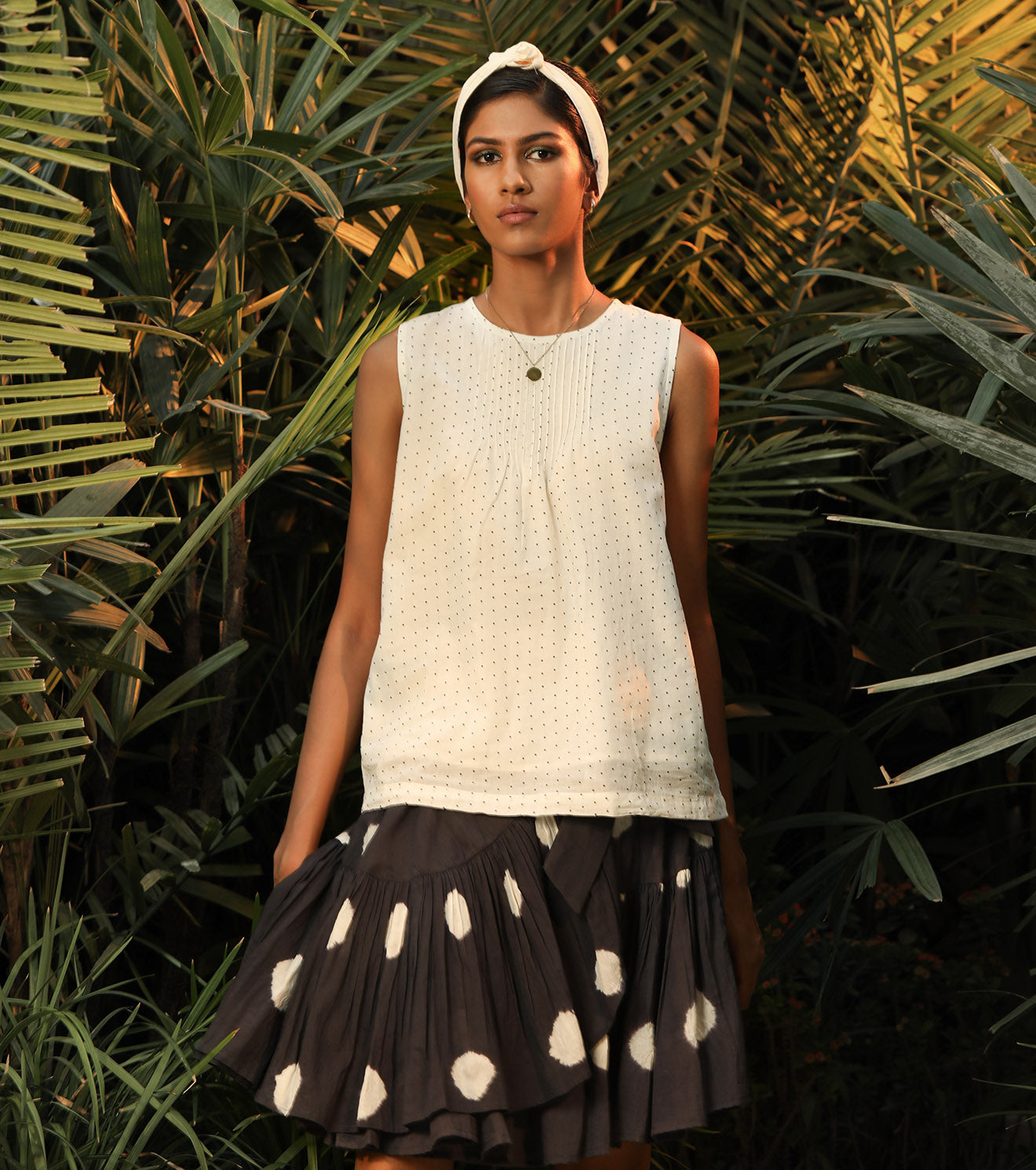 White Print Top at Kamakhyaa by Khara Kapas. This item is Lost In paradise, Mul Cotton, Natural, Prints, Regular Fit, Resort Wear, Sleeveless Tops, Tops, White, Womenswear
