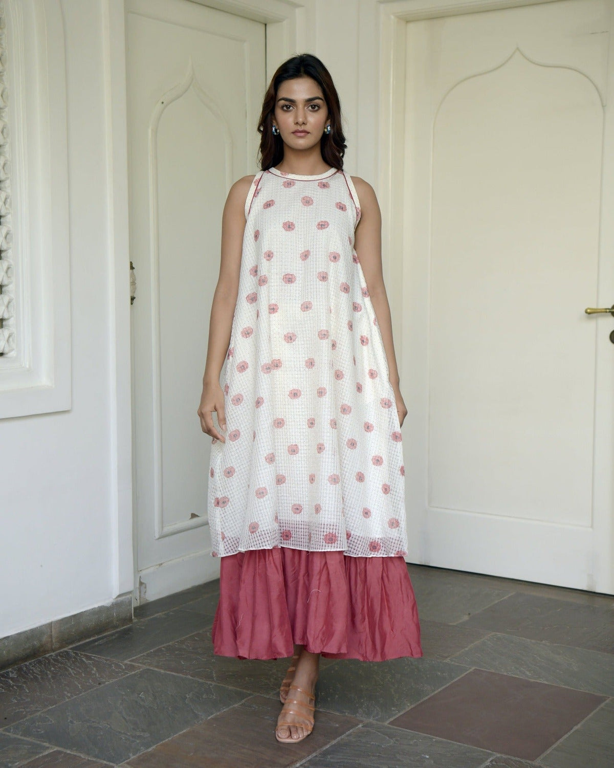 White Printed Cotton Maxi Dress at Kamakhyaa by Taro. This item is Evening Wear, Handwoven cotton, Indo-Western, July Sale, July Sale 2023, Maxi Dresses, Natural, Prints, Regular Fit, Sleeveless Dresses, White, Wildflower Taro, Womenswear