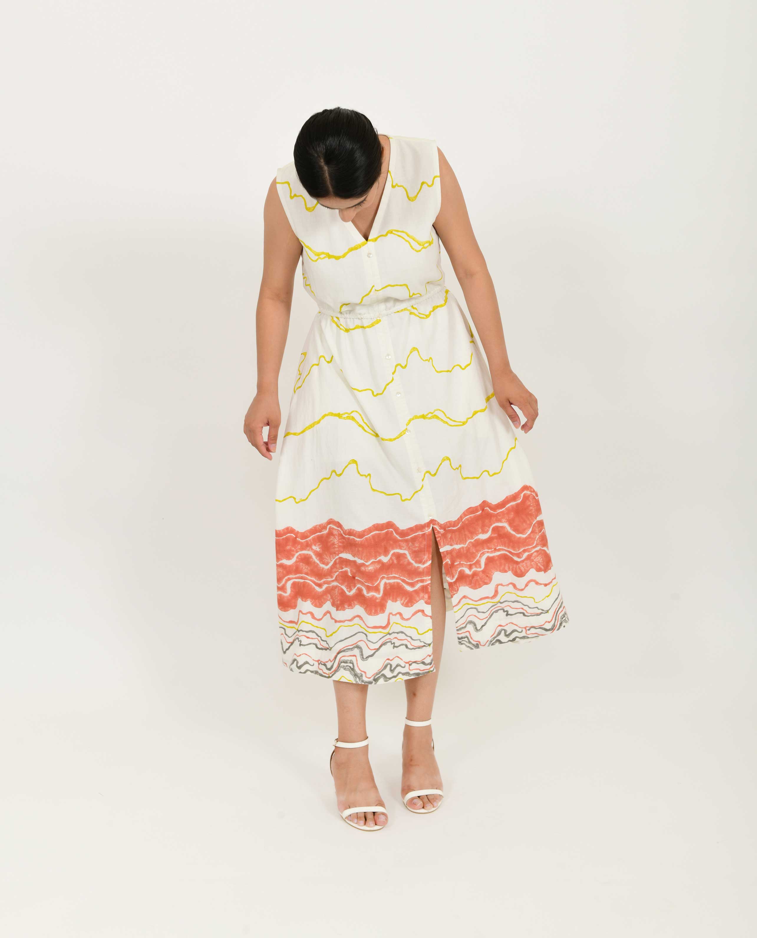 White Printed Front Buttoned Dress at Kamakhyaa by Rias Jaipur. This item is Azo Free Dye, Bamboo, Block Prints, Casual Wear, Cotton, Midi Dresses, Parat, Regular Fit, Shirt Dresses, Sleeveless Dresses, White, Womenswear