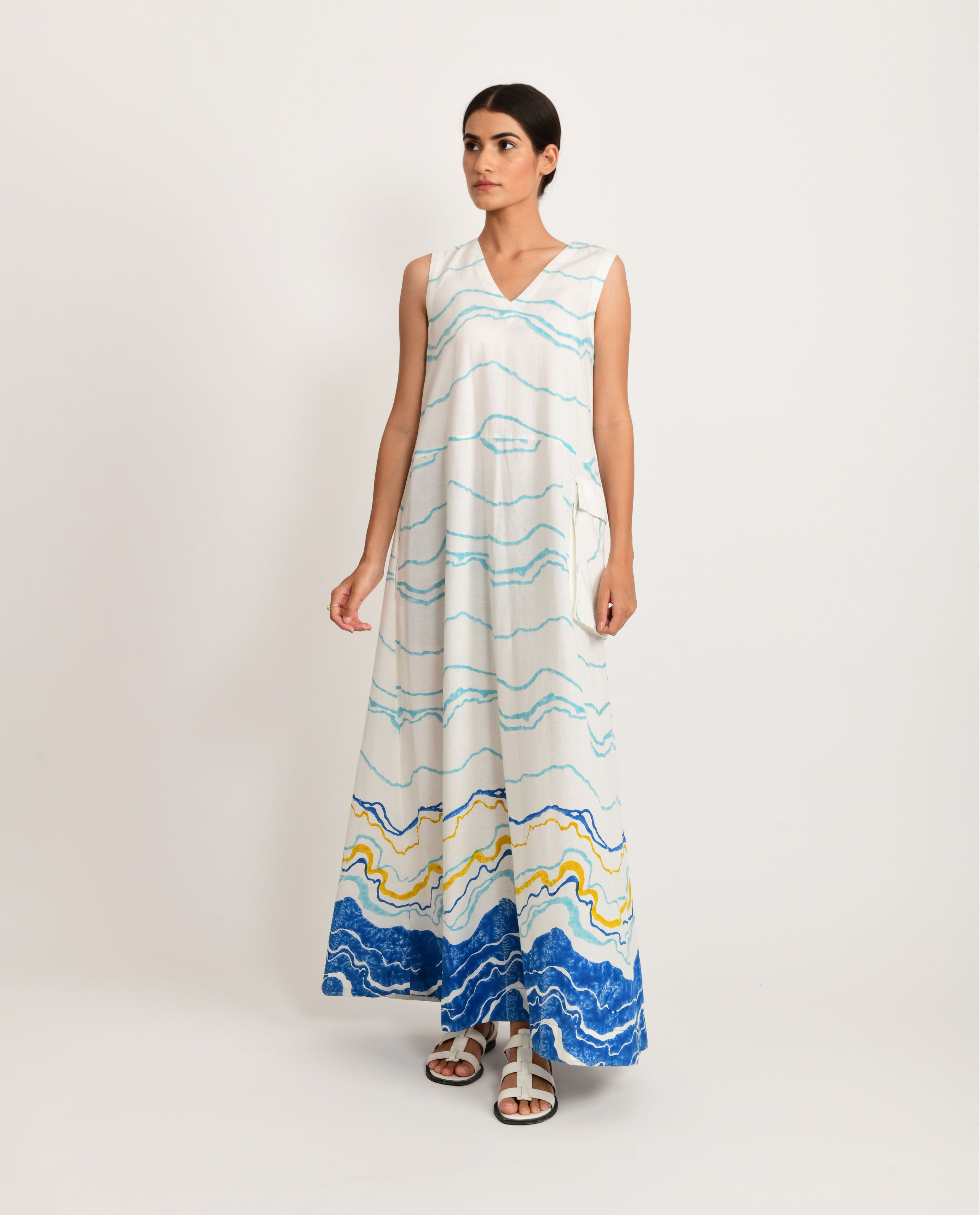 White Printed Sleeveless Dress at Kamakhyaa by Rias Jaipur. This item is Azo Free Dye, Bamboo, Block Prints, Casual Wear, Cotton, Maxi Dresses, Parat, Regular Fit, Sleeveless Dresses, White, Womenswear