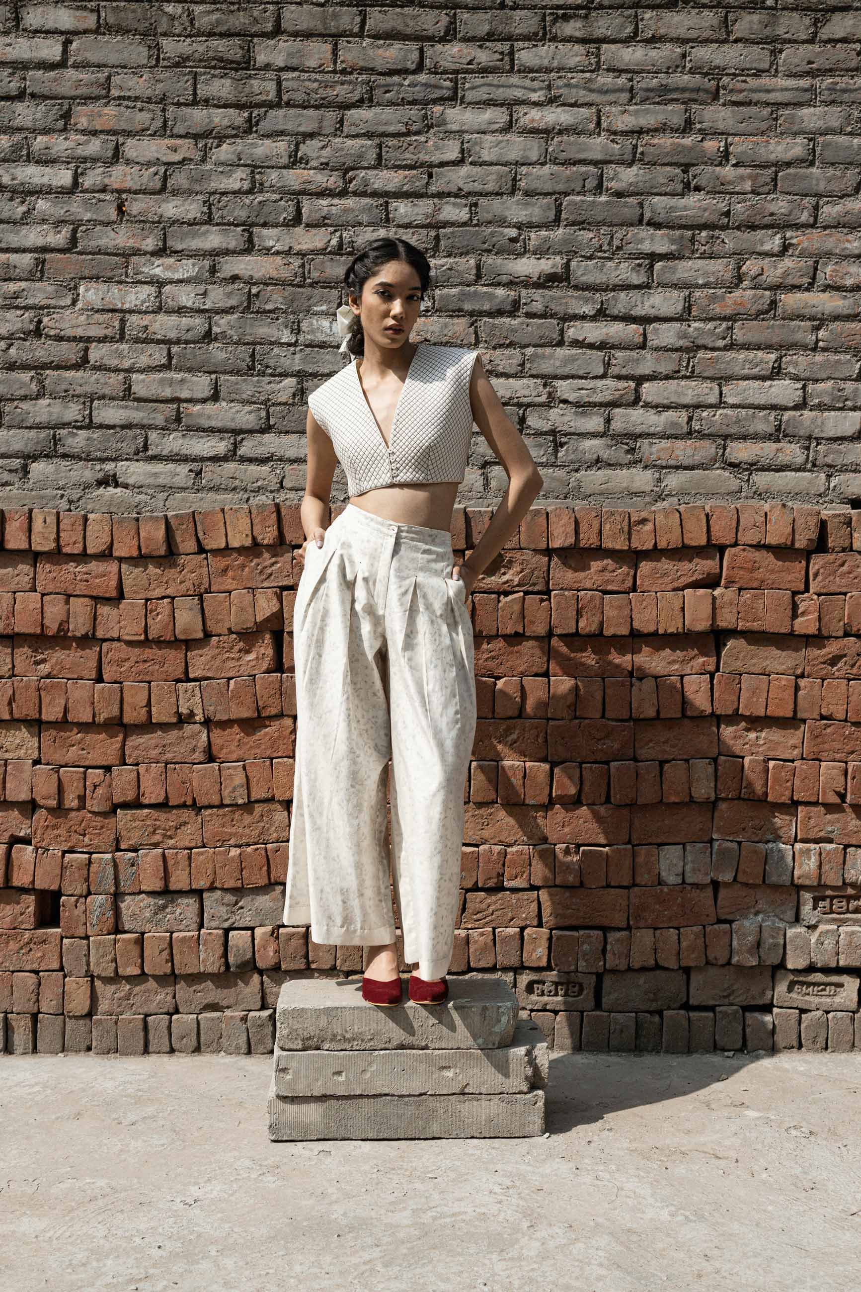 White Quilted Blouse at Kamakhyaa by Ahmev. This item is Best Selling, Casual Wear, Chanderi, Indian Wear, Ink And Ivory, Natural, Regular Fit, Saree Blouses, Textured, White, Womenswear