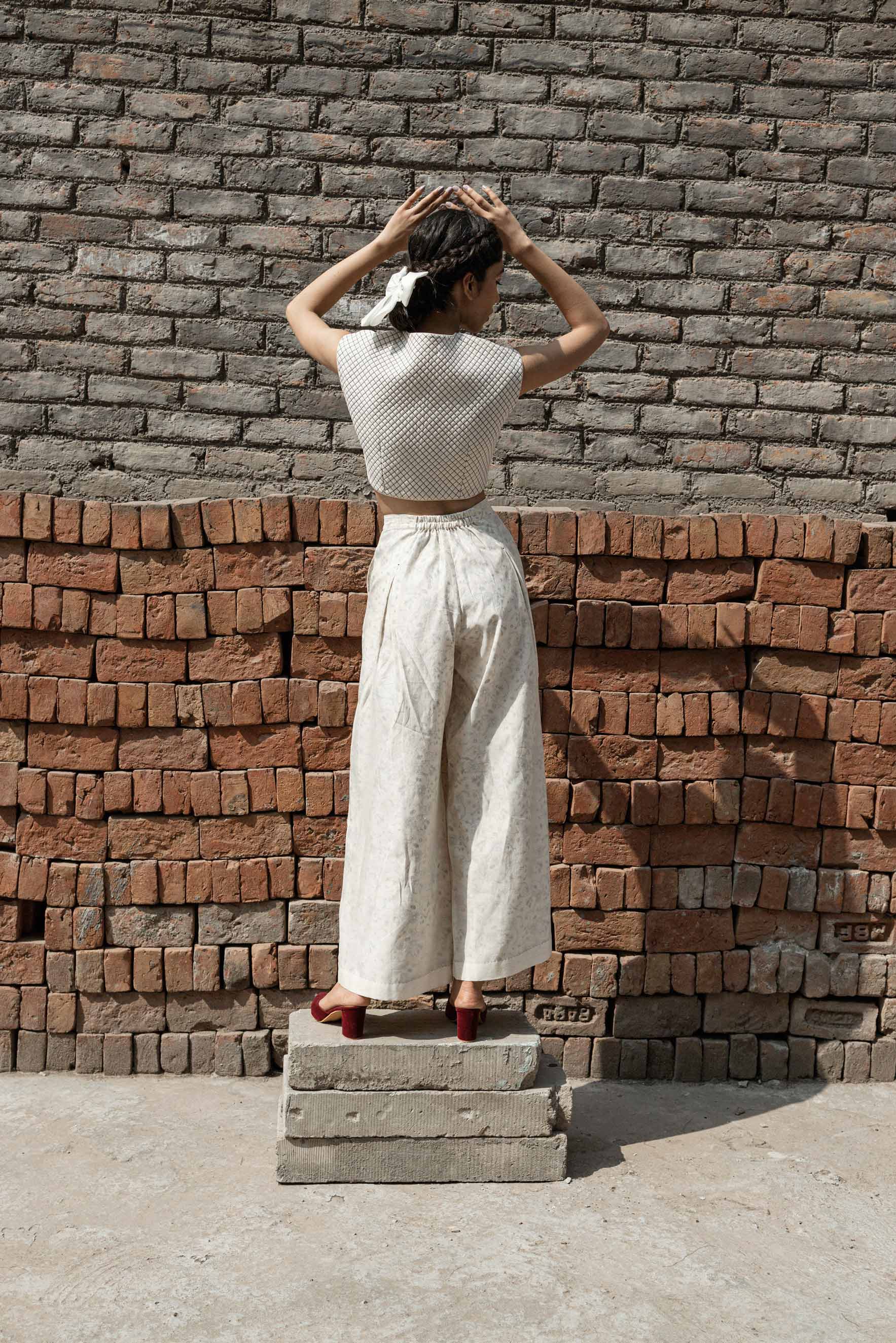 White Quilted Blouse at Kamakhyaa by Ahmev. This item is Best Selling, Casual Wear, Chanderi, Indian Wear, Ink And Ivory, Natural, Regular Fit, Saree Blouses, Textured, White, Womenswear