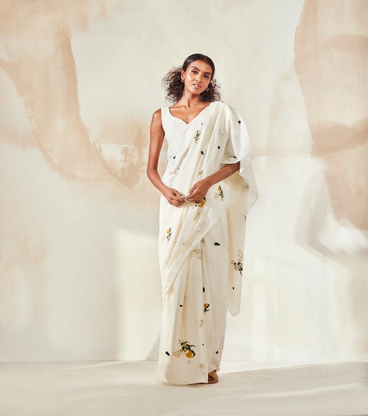 White Saree at Kamakhyaa by Khara Kapas. This item is Endless Summer, Indian Wear, Mulmul, Natural, Prints, Regular Fit, Resort Wear, Sarees, White, Womenswear