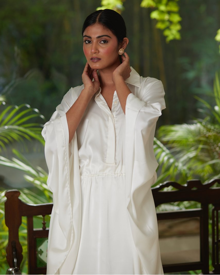 White Satin Silk Kaftan With Collar at Kamakhyaa by Mayura Kumar. This item is Ajrakh Heritage, Casual Wear, Dresses, Festive Wear, Kaftans, Mayura Kumar, Modal Silk, Relaxed Fit, Solids, White, Womenswear