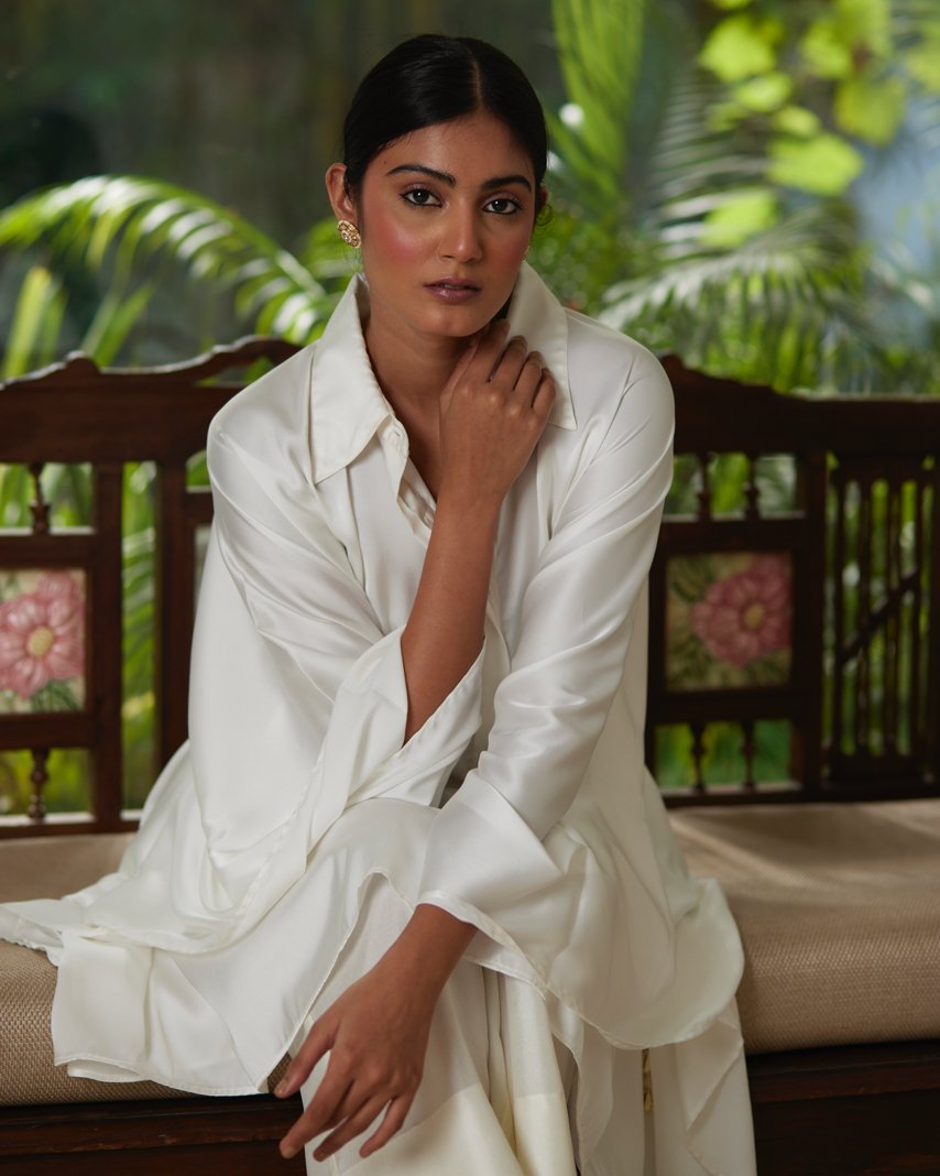 White Satin Silk Kaftan With Collar at Kamakhyaa by Mayura Kumar. This item is Ajrakh Heritage, Casual Wear, Dresses, Festive Wear, Kaftans, Mayura Kumar, Modal Silk, Relaxed Fit, Solids, White, Womenswear