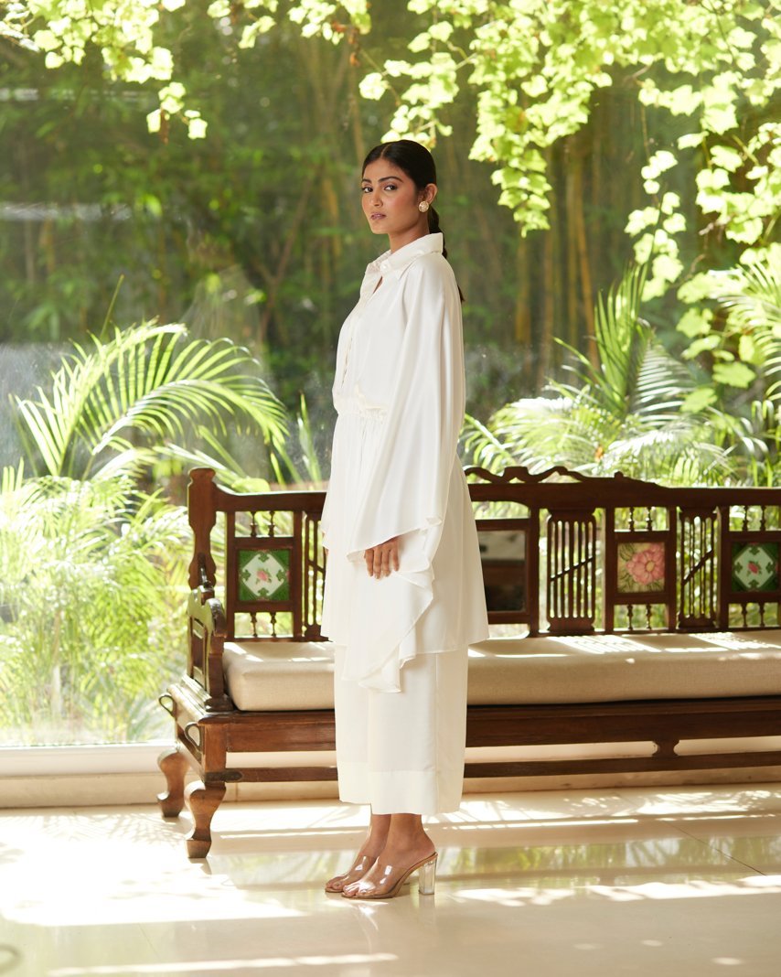 White Satin Silk Kaftan With Collar at Kamakhyaa by Mayura Kumar. This item is Ajrakh Heritage, Casual Wear, Dresses, Festive Wear, Kaftans, Mayura Kumar, Modal Silk, Relaxed Fit, Solids, White, Womenswear