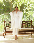 White Satin Silk Kaftan With Collar at Kamakhyaa by Mayura Kumar. This item is Ajrakh Heritage, Casual Wear, Dresses, Festive Wear, Kaftans, Mayura Kumar, Modal Silk, Relaxed Fit, Solids, White, Womenswear