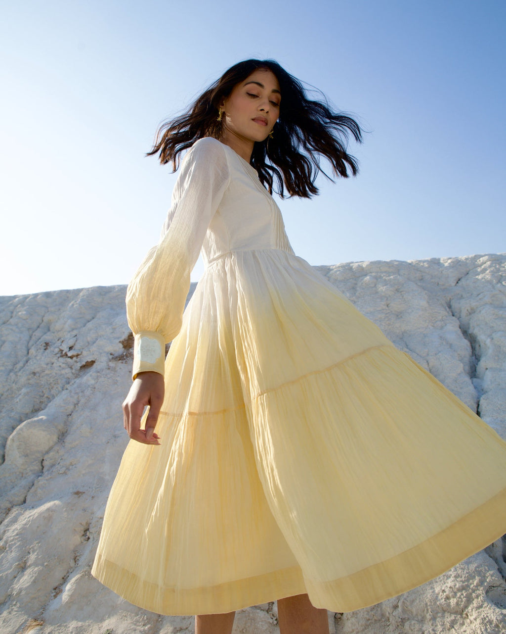 White Silk Midi Dress at Kamakhyaa by The Loom Art. This item is Aurora SS24, Best Selling, Casual Wear, Chanderi Silk, FB ADS JUNE, July Sale, July Sale 2023, Kurtas, Midi Dresses, Ombre & Dyes, Organic, Regular Fit, Tiered Dresses, White, Womenswear