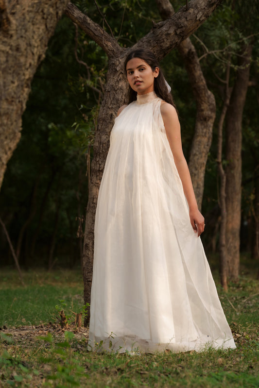White Silk Organza & Sheer Long Dress at Kamakhyaa by Ahmev. This item is Casual Wear, Cotton, FB ADS JUNE, Fitted At Waist, Halter Neck Dresses, July Sale, July Sale 2023, Maxi Dresses, Natural, Silk Organza, Solids, White, Womenswear