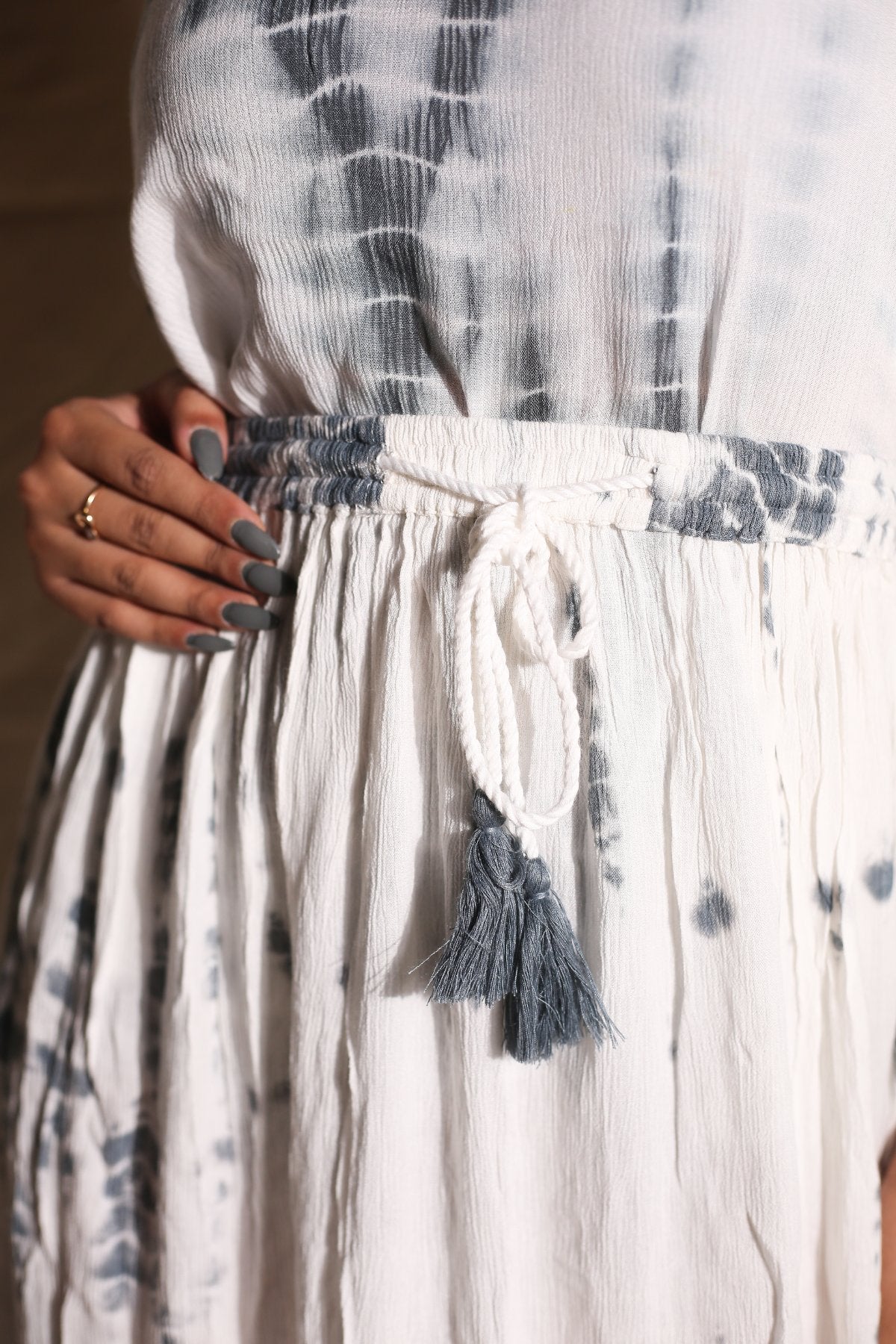 White Skirt And Top- Set of Two at Kamakhyaa by Keva. This item is Best Selling, Co-ord Sets, Crepe, Day Dream, Lounge Wear Co-ords, Natural, Rayon, Relaxed Fit, Resort Wear, Skirt Sets, Tie & Dye, Vacation Co-ords, White, Womenswear