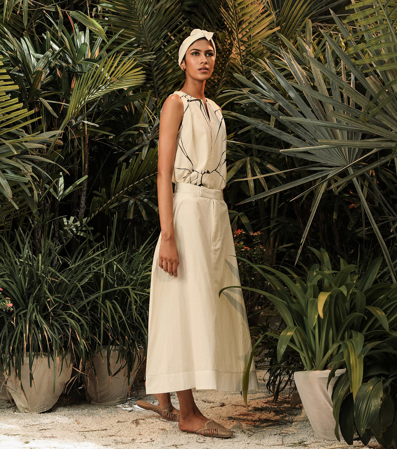 White Skirt at Kamakhyaa by Khara Kapas. This item is Fitted At Waist, Lost In paradise, Midi Skirts, Mul Cotton, Natural, Poplin, Resort Wear, Selfsame, Skirts, Solids, White, Womenswear