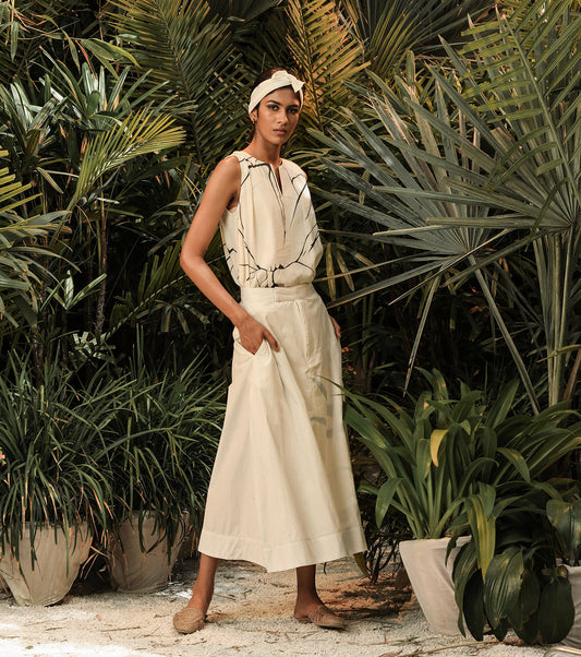 White Skirt at Kamakhyaa by Khara Kapas. This item is Fitted At Waist, Lost In paradise, Midi Skirts, Mul Cotton, Natural, Poplin, Resort Wear, Selfsame, Skirts, Solids, White, Womenswear