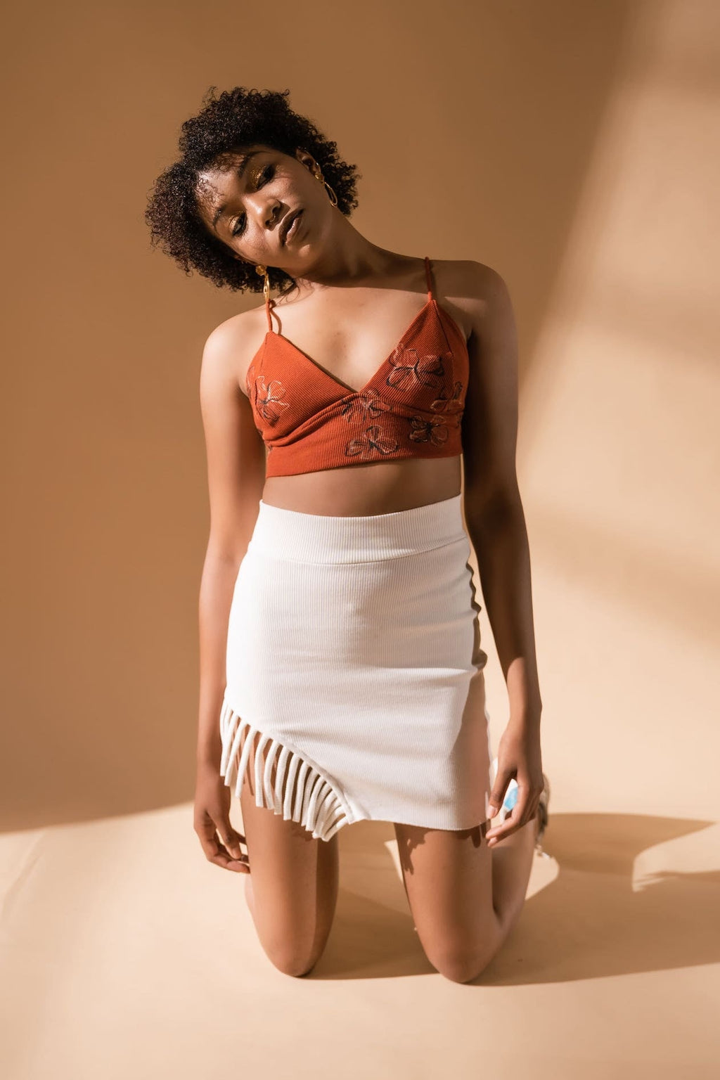 White Skirt at Kamakhyaa by Meko Studio. This item is Cotton, Deadstock Fabrics, Evening Wear, For Birthday, July Sale, July Sale 2023, Lycra, Mini Skirts, Skirts, Slim Fit, Solids, Verao SS-22/23, White, Womenswear