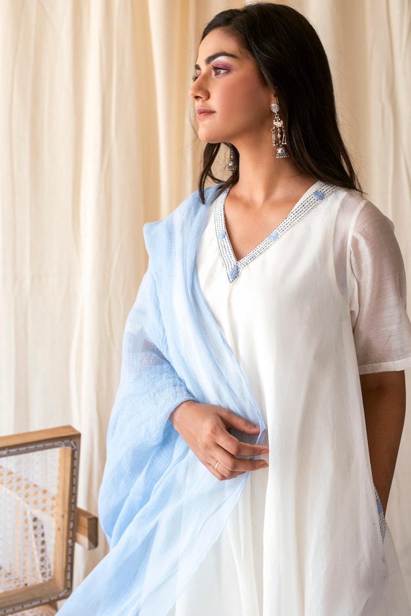 White Sky Set at Kamakhyaa by Taro. This item is Best Selling, Evening Wear, Indian Wear, Indo-Western, July Sale, July Sale 2023, Kurta Palazzo Sets, Kurta Set With Dupatta, Natural, Relaxed Fit, Rozana Taro, Silk Chanderi, Solids, White, Womenswear