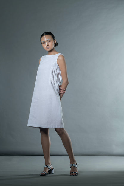 White Sleeveless Mini Dress at Kamakhyaa by Anushé Pirani. This item is Easter, Handwoven Jute Cotton, July Sale, July Sale 2023, Mini Dresses, Natural, Office Wear, Playful Office Wear, Relaxed Fit, sale anushe pirani, Sleeveless Dresses, Solids, The Line Tales, White, Womenswear