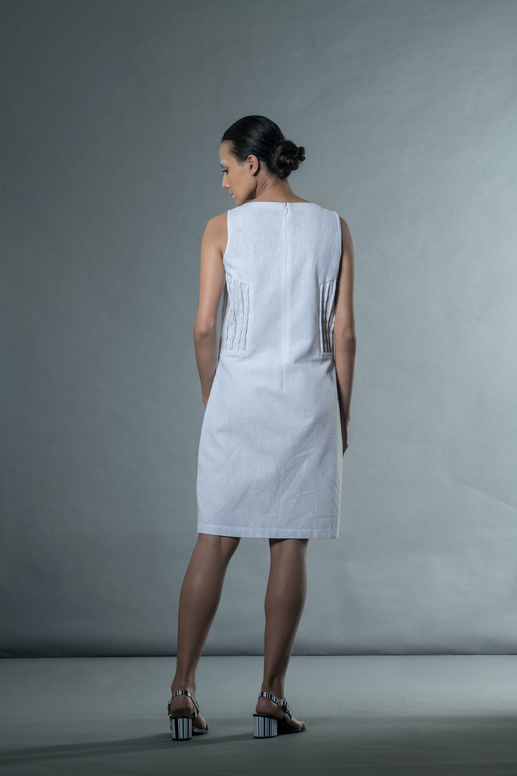 White Sleeveless Mini Dress at Kamakhyaa by Anushé Pirani. This item is Easter, Handwoven Jute Cotton, July Sale, July Sale 2023, Mini Dresses, Natural, Office Wear, Playful Office Wear, Relaxed Fit, sale anushe pirani, Sleeveless Dresses, Solids, The Line Tales, White, Womenswear