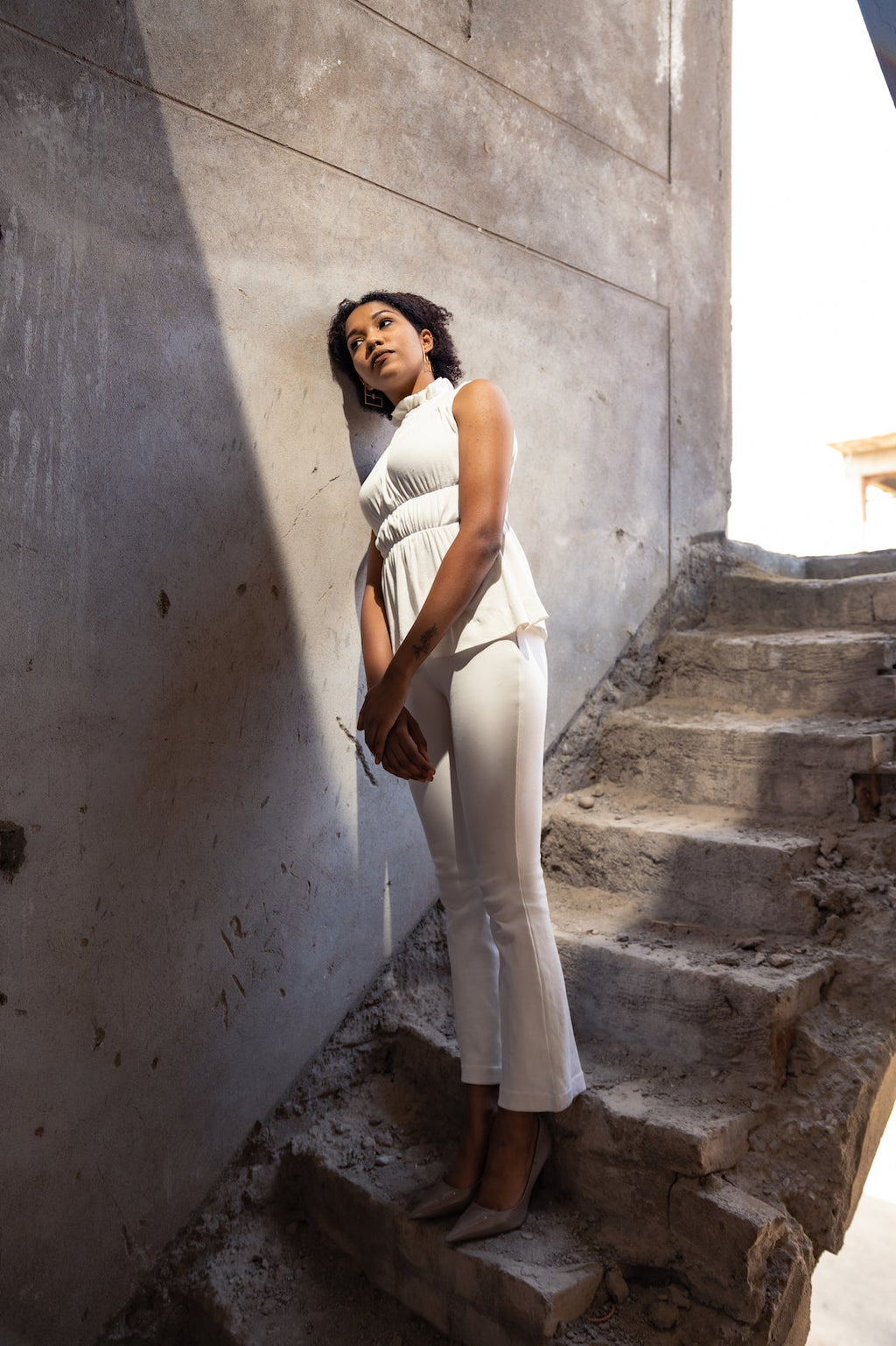 White Sleeveless Top at Kamakhyaa by Meko Studio. This item is Cotton, Deadstock Fabrics, Evening Wear, High Neck Tops, July Sale, July Sale 2023, Lycra, Relaxed Fit, Sleeveless Tops, Solids, Tops, Turtle Neck Tops, Verao SS-22/23, White, Womenswear