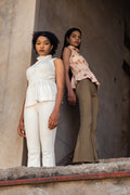 White Sleeveless Top at Kamakhyaa by Meko Studio. This item is Cotton, Deadstock Fabrics, Evening Wear, High Neck Tops, July Sale, July Sale 2023, Lycra, Relaxed Fit, Sleeveless Tops, Solids, Tops, Turtle Neck Tops, Verao SS-22/23, White, Womenswear