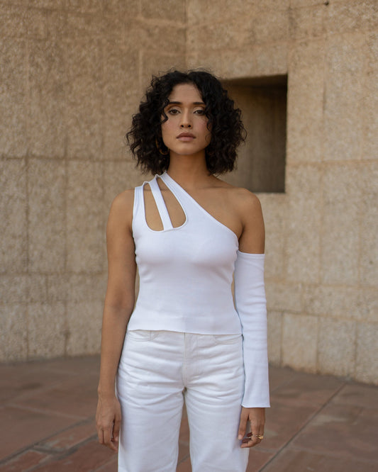 White Sleeveless Top at Kamakhyaa by Meko Studio. This item is Cotton, Evening Wear, July Sale, July Sale 2023, Lycra, One Shoulder Tops, Slim Fit, Solid Selfmade, Solids, Sourced from dead stock yarns, Tops, Tranquil AW-22/23, White, Womenswear