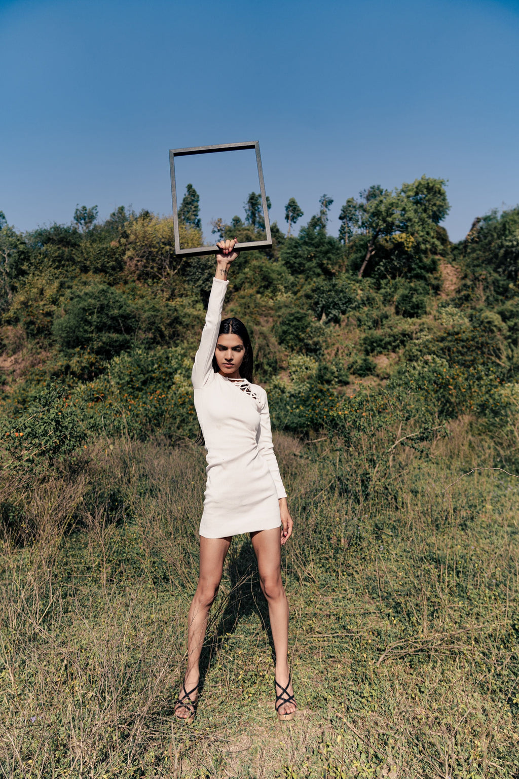 White Solid Mini Dress at Kamakhyaa by Meko Studio. This item is Deadstock Fabrics, Evening Wear, July Sale, July Sale 2023, Mini Dresses, Slim Fit, Solids, Verao SS-22/23, White, Womenswear