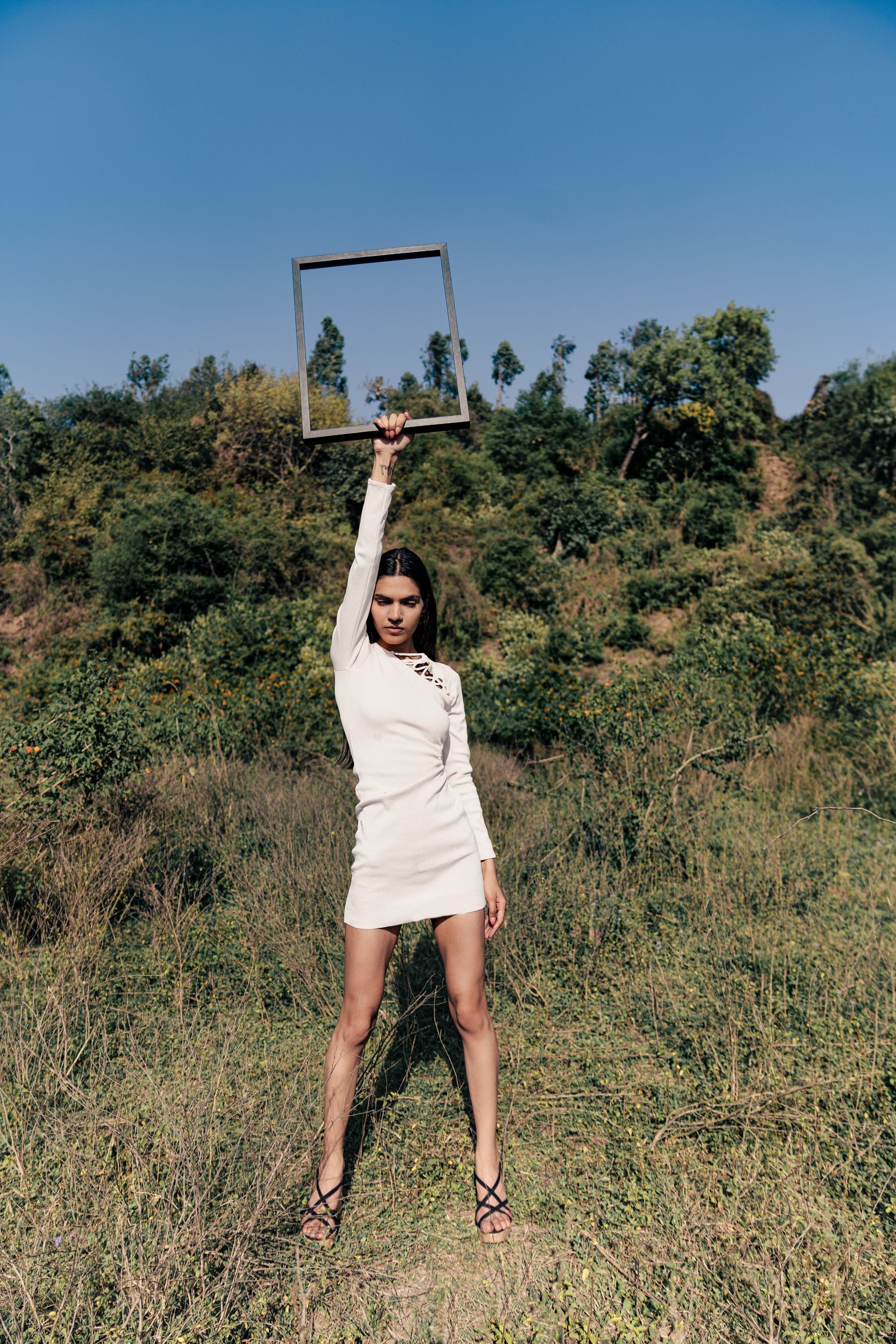 White Solid Mini Dress at Kamakhyaa by Meko Studio. This item is Deadstock Fabrics, Evening Wear, July Sale, July Sale 2023, Mini Dresses, Slim Fit, Solids, Verao SS-22/23, White, Womenswear