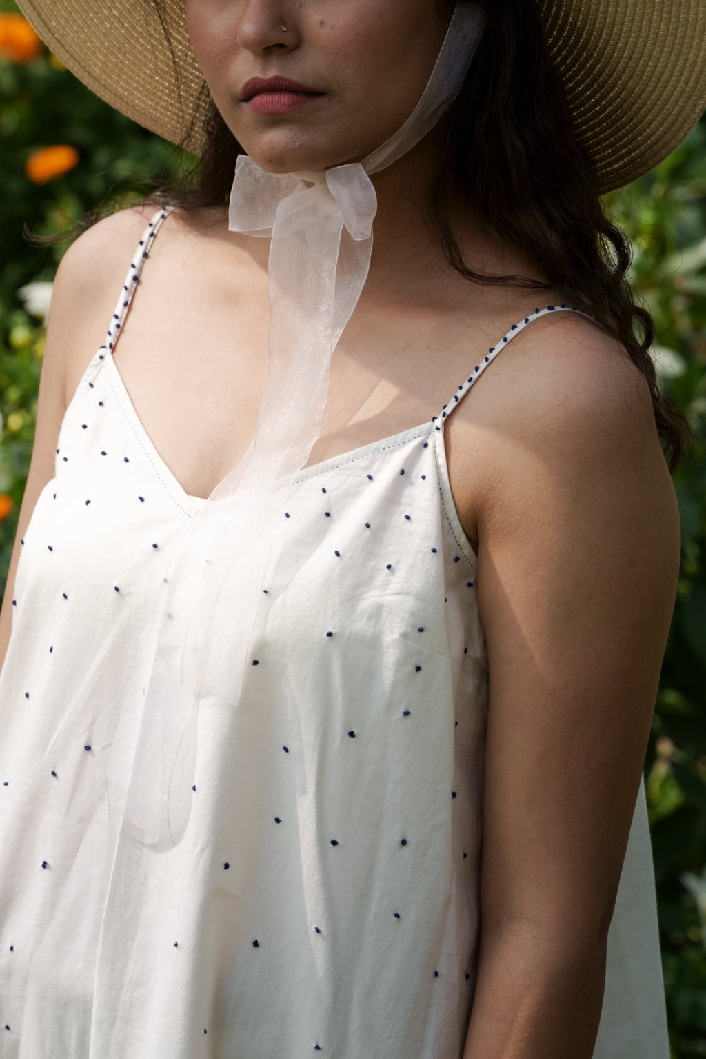 White Strap Maxi Dress at Kamakhyaa by Ahmev. This item is Casual Wear, Cotton, July Sale, July Sale 2023, Maxi Dresses, Natural, Relaxed Fit, Sleeveless Dresses, Solids, Strap Dresses, Tiered Dresses, White, Womenswear