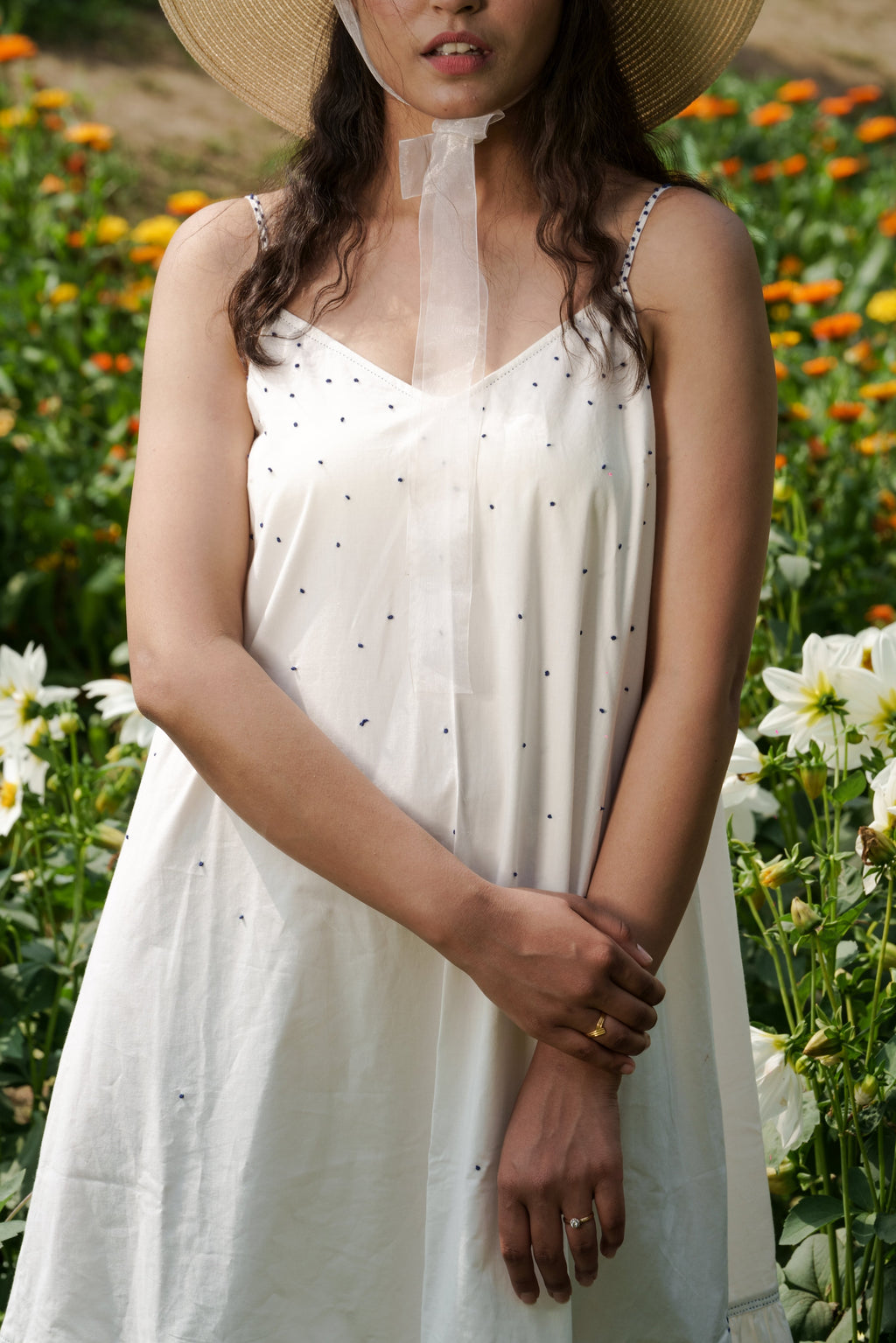 White Strap Maxi Dress at Kamakhyaa by Ahmev. This item is Casual Wear, Cotton, July Sale, July Sale 2023, Maxi Dresses, Natural, Relaxed Fit, Sleeveless Dresses, Solids, Strap Dresses, Tiered Dresses, White, Womenswear