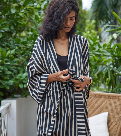 White Striped Cotton Shrug at Kamakhyaa by Khara Kapas. This item is Black, Cotton, Lounge Wear, Natural, Relaxed Fit, Selfsame, Shrugs, Stripes, White, Womenswear
