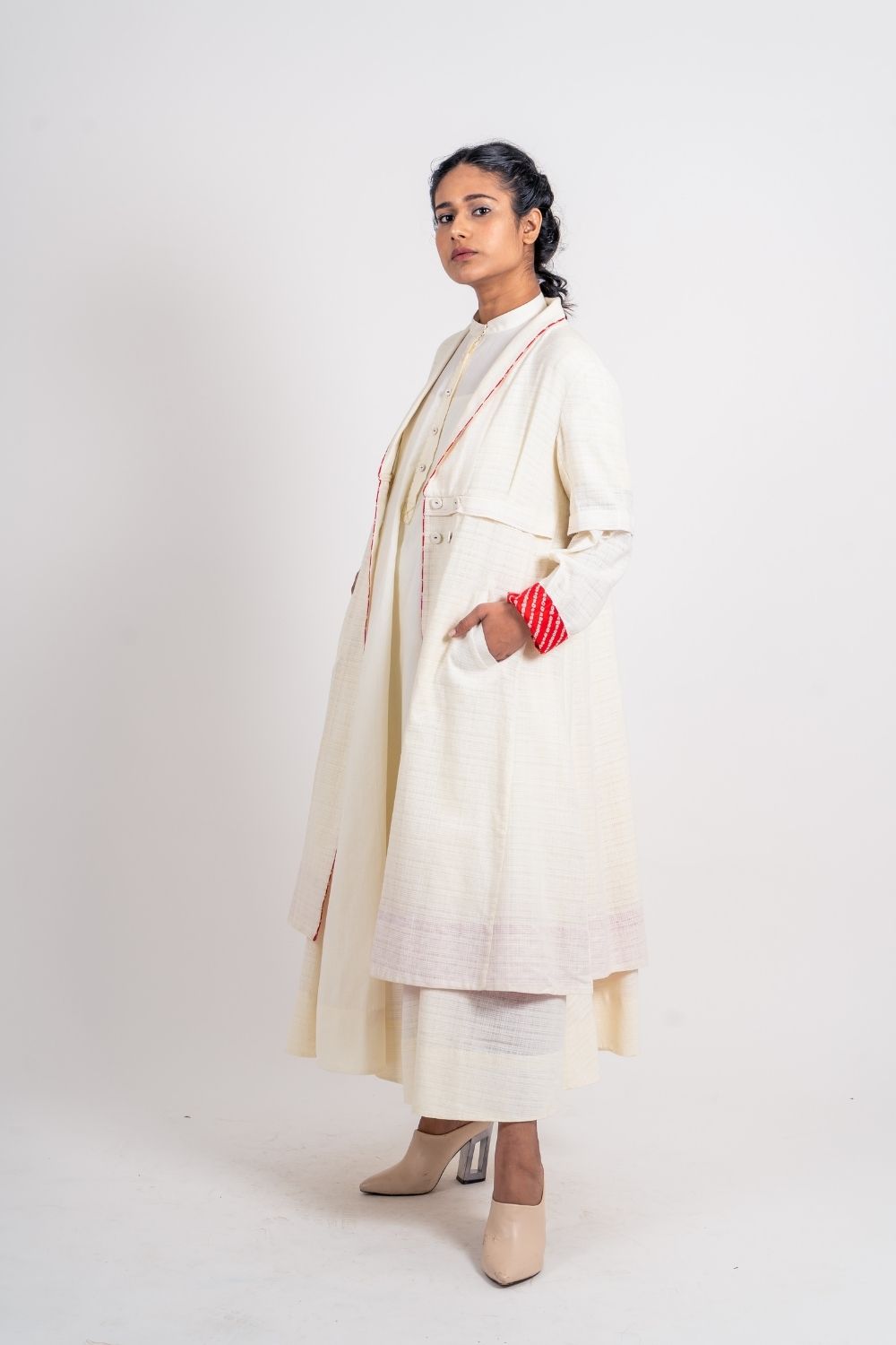 White Textured Long Jacket at Kamakhyaa by Ahmev. This item is Casual Wear, Coats, Handloom Cotton, Highend fashion, July Sale, July Sale 2023, Natural, Solids, White, Womenswear