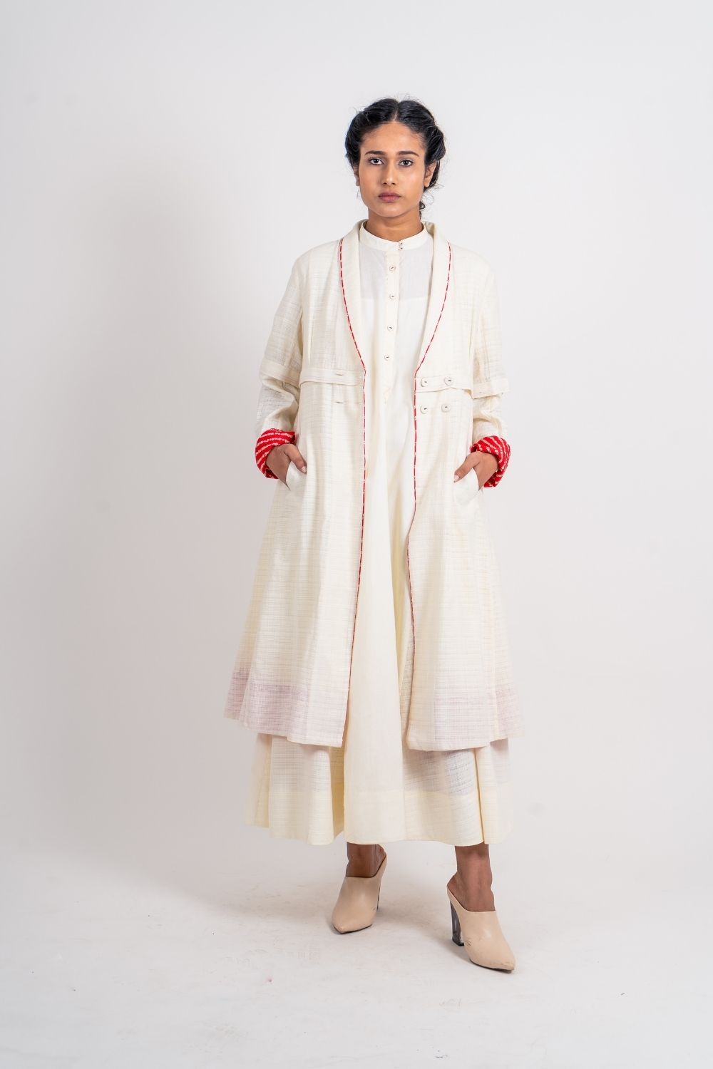 White Textured Long Jacket at Kamakhyaa by Ahmev. This item is Casual Wear, Coats, Handloom Cotton, Highend fashion, July Sale, July Sale 2023, Natural, Solids, White, Womenswear