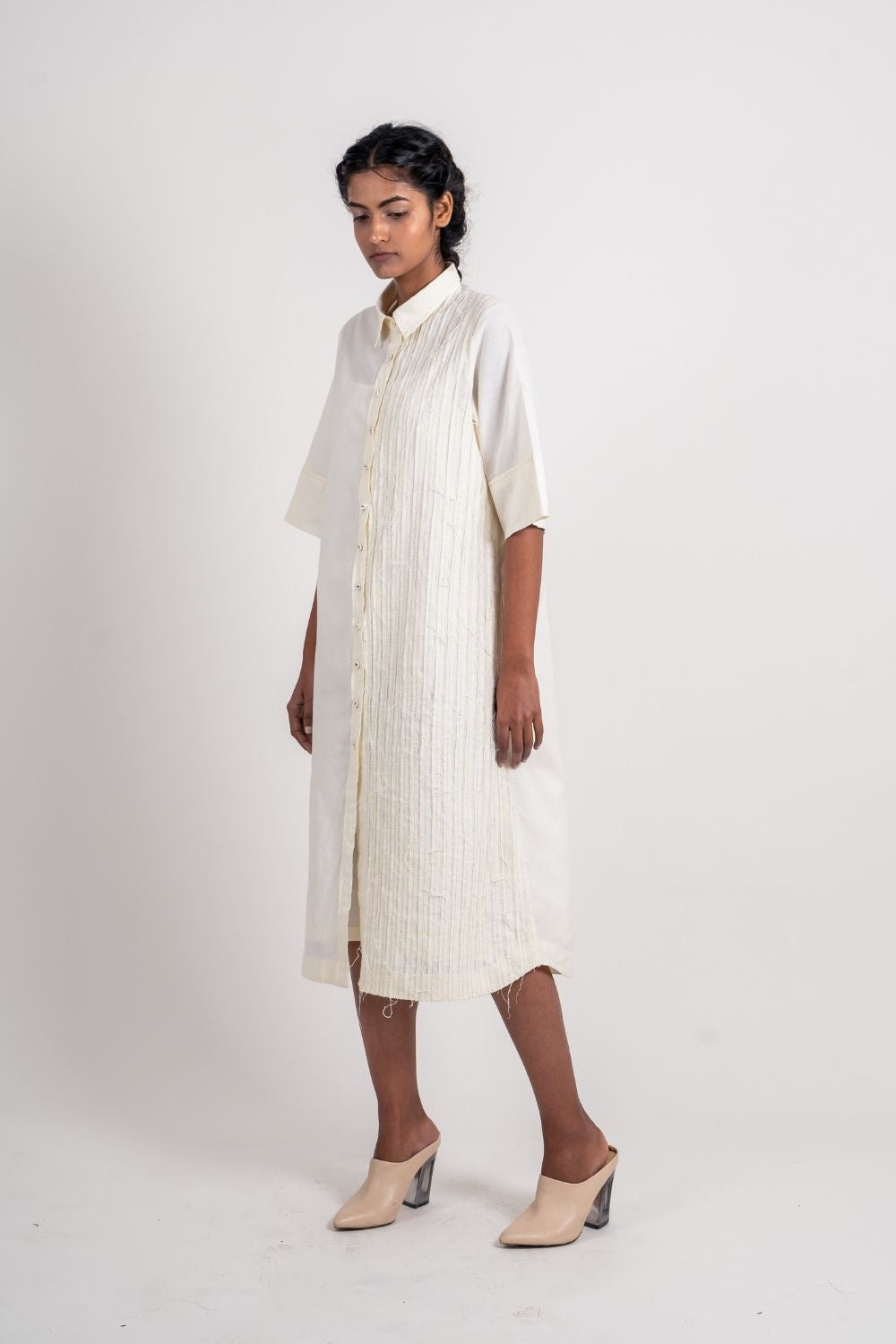 White Textured Midi Dress at Kamakhyaa by Ahmev. This item is Casual Wear, Handloom Cotton, Highend fashion, July Sale, July Sale 2023, Natural, Relaxed Fit, Shirt Dresses, Shirts, Textured, White, Womenswear