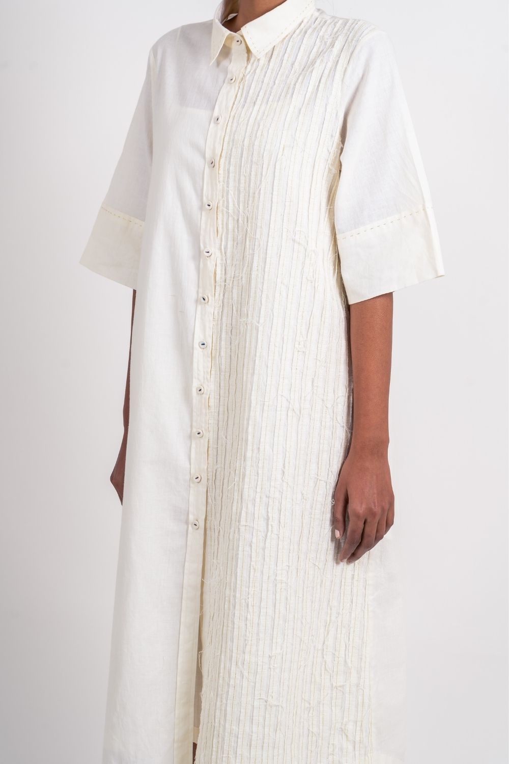 White Textured Midi Dress at Kamakhyaa by Ahmev. This item is Casual Wear, Handloom Cotton, Highend fashion, July Sale, July Sale 2023, Natural, Relaxed Fit, Shirt Dresses, Shirts, Textured, White, Womenswear