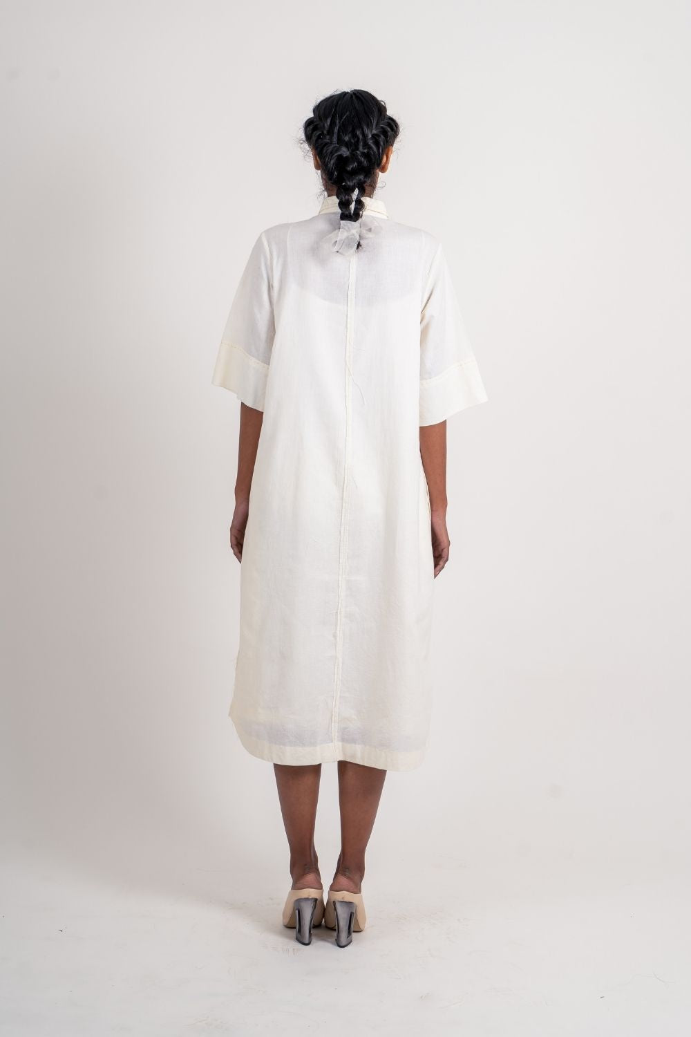 White Textured Midi Dress at Kamakhyaa by Ahmev. This item is Casual Wear, Handloom Cotton, Highend fashion, July Sale, July Sale 2023, Natural, Relaxed Fit, Shirt Dresses, Shirts, Textured, White, Womenswear