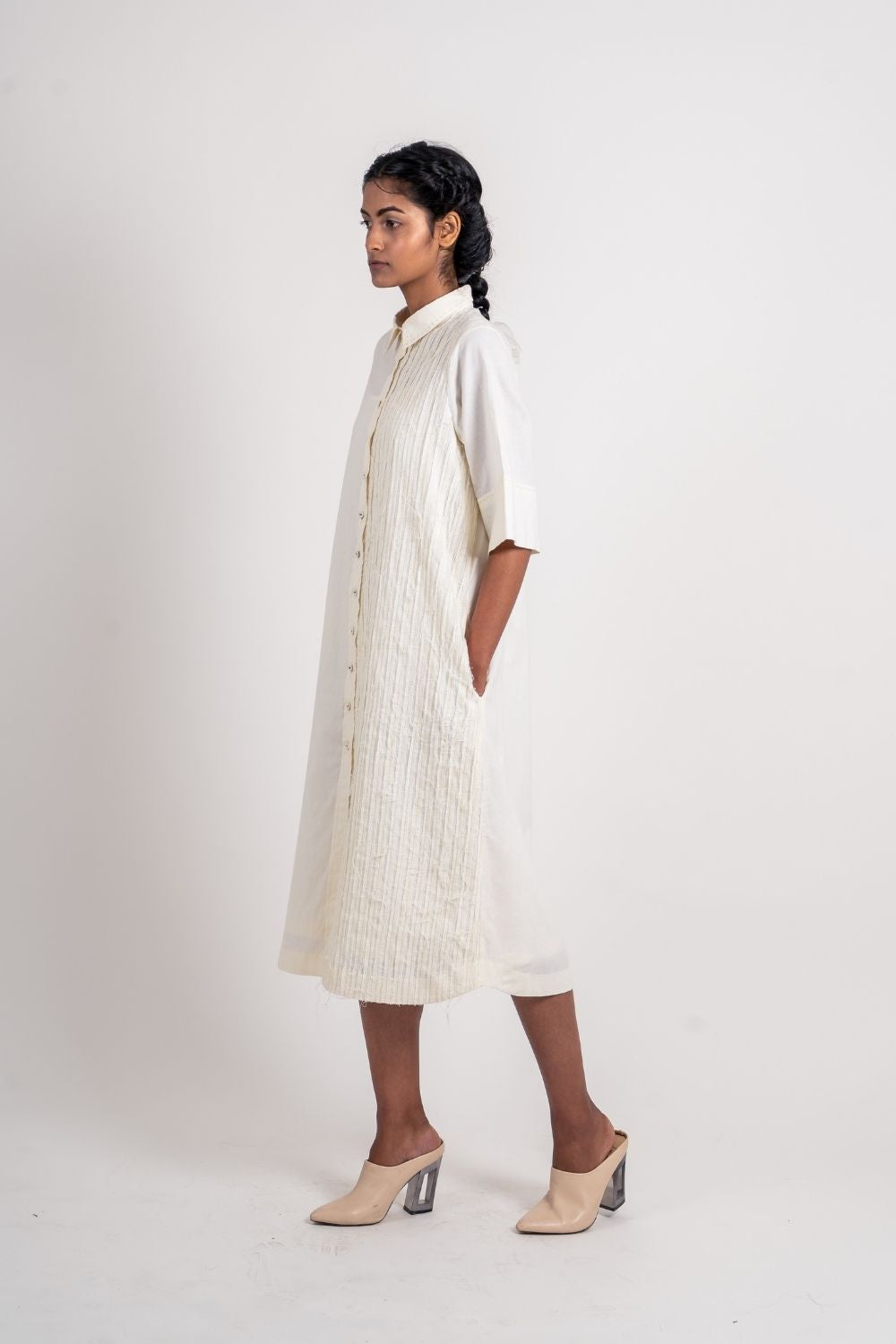 White Textured Midi Dress at Kamakhyaa by Ahmev. This item is Casual Wear, Handloom Cotton, Highend fashion, July Sale, July Sale 2023, Natural, Relaxed Fit, Shirt Dresses, Shirts, Textured, White, Womenswear