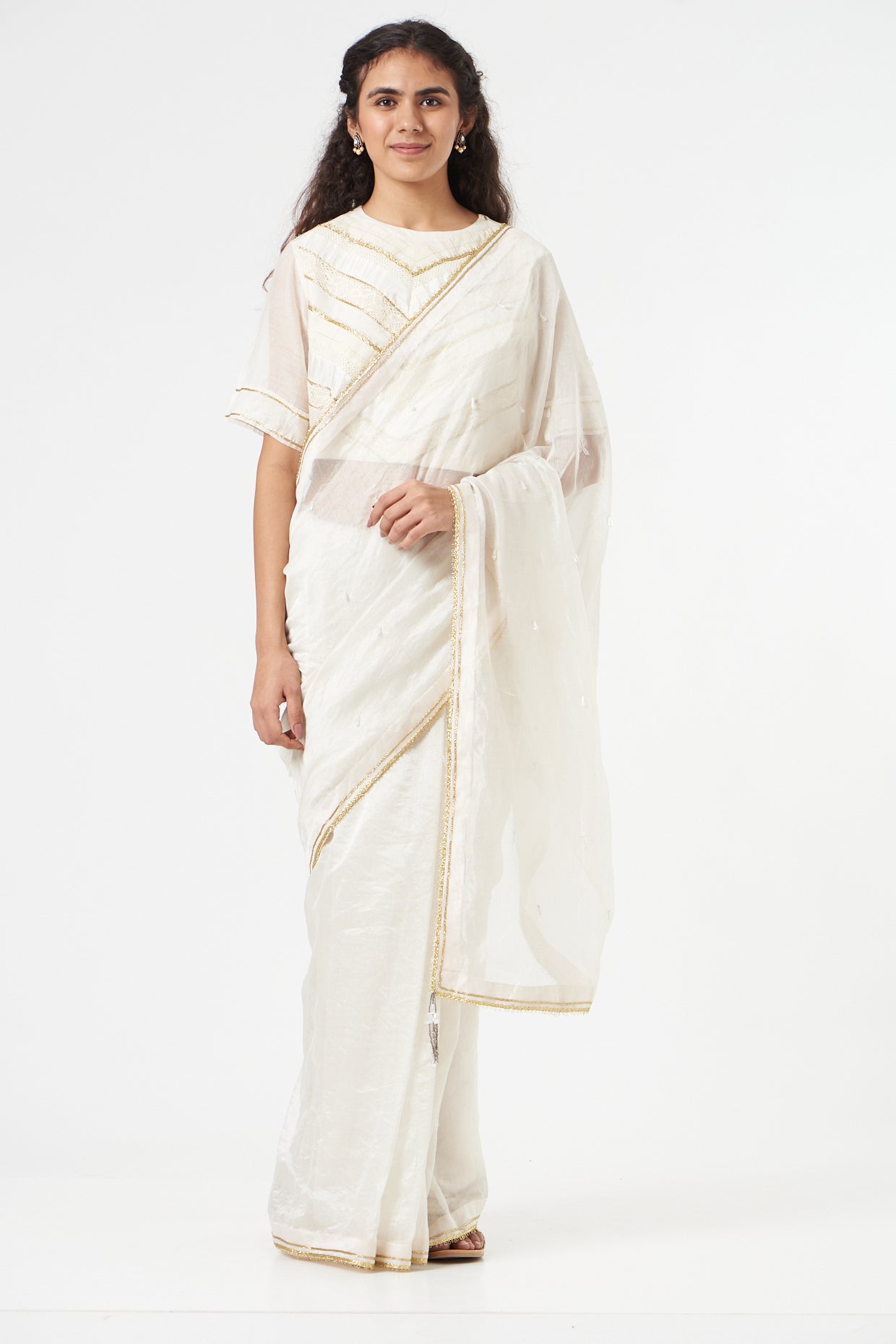 White Textured Saree + Peticot at Kamakhyaa by Ahmev. This item is Casual Wear, Festive '22, Free Size, Indian Wear, July Sale, July Sale 2023, Natural, New, Regular Fit, Saree Sets, Silk Chanderi, Textured, White, Womenswear