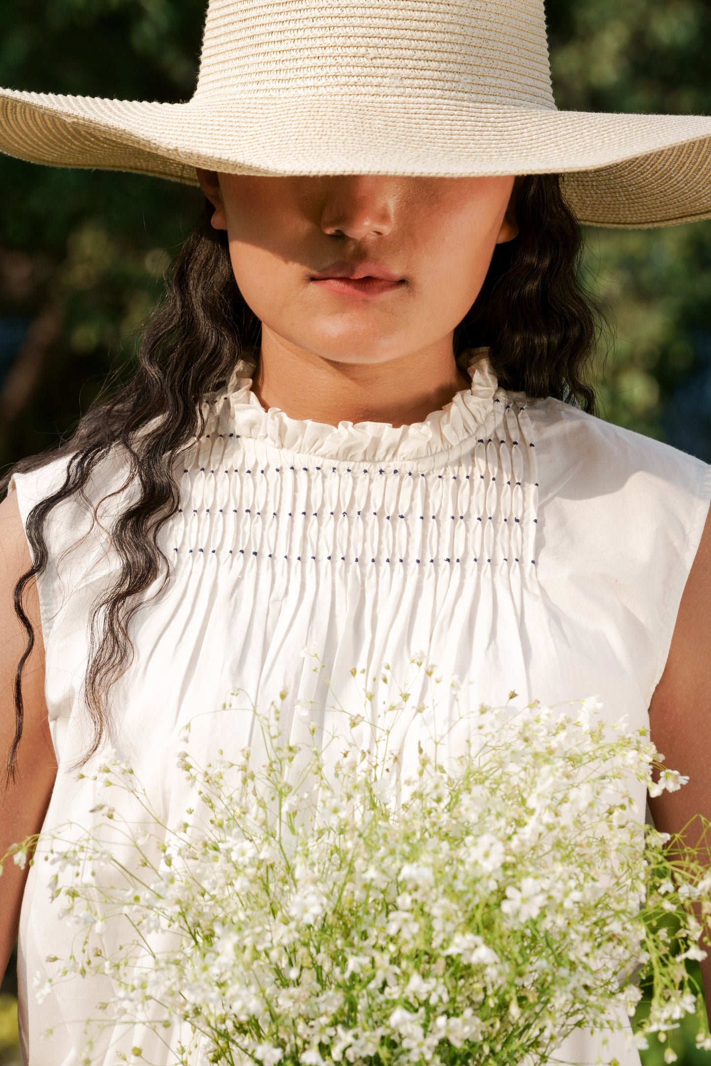 White Tie-up Top at Kamakhyaa by Ahmev. This item is Backless Tops, Casual Wear, Cotton, Highend fashion, July Sale, July Sale 2023, Natural, Relaxed Fit, Sleeveless Tops, Textured, Tops, White, Womenswear
