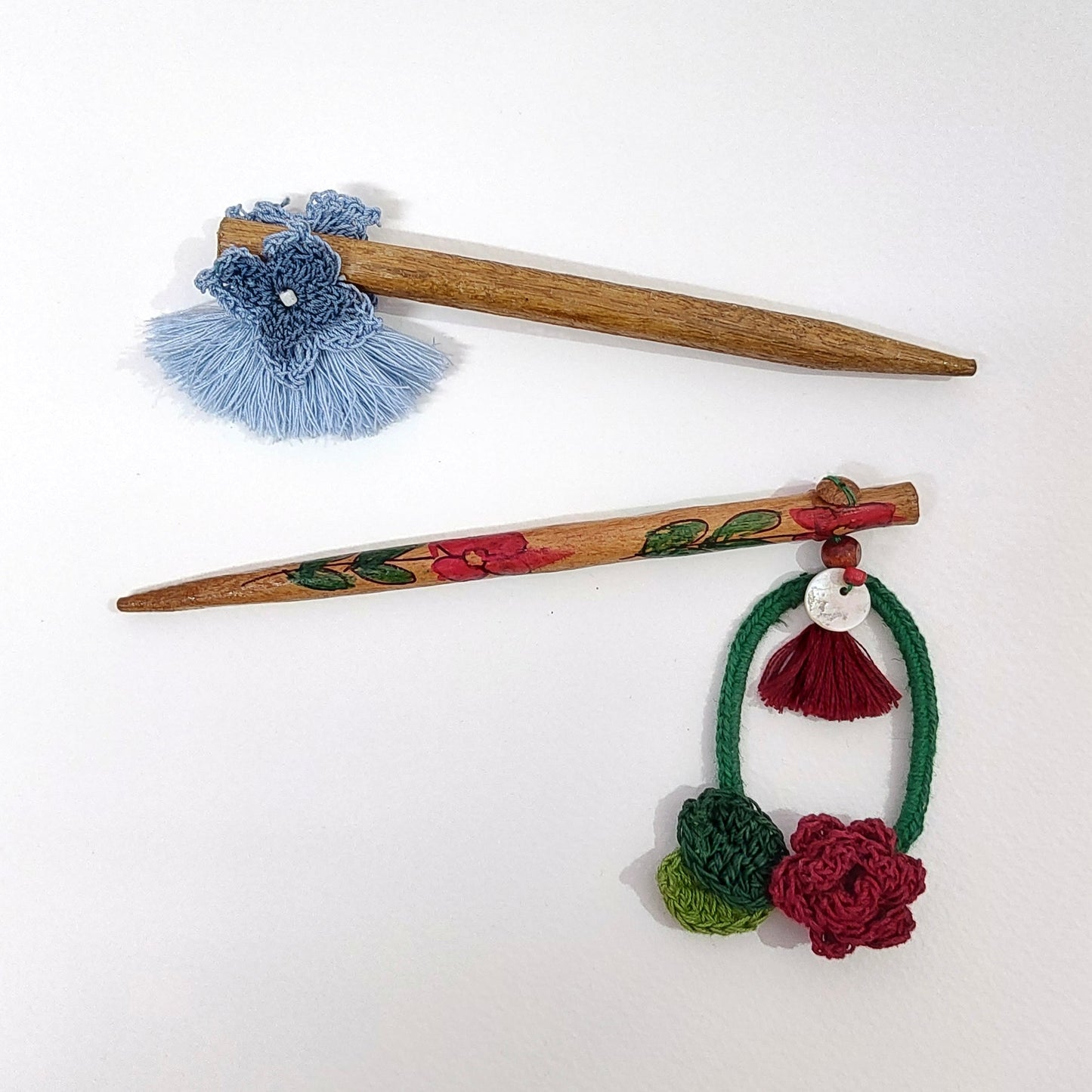 Wooden Hair Stick Blue And Red at Kamakhyaa by Ikriit'm. This item is Accessories, Blue, Cotton Yarn, Hair Accessory, Ikriit'm, Red, Wood