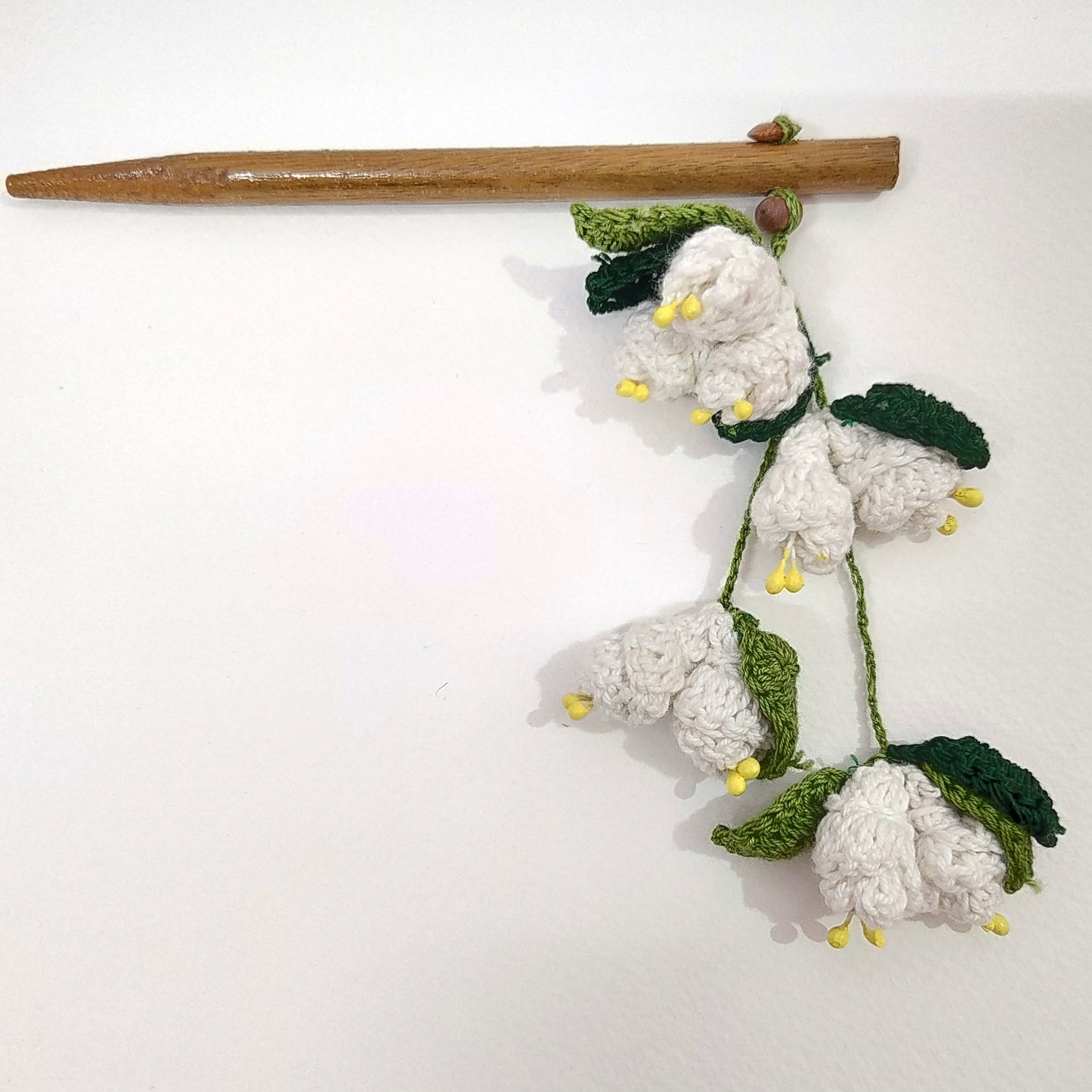 Wooden Hair Stick Mogra Off White And Green at Kamakhyaa by Ikriit'm. This item is Accessories, Cotton Yarn, Green, Hair Accessory, Ikriit'm, Off White, Wood