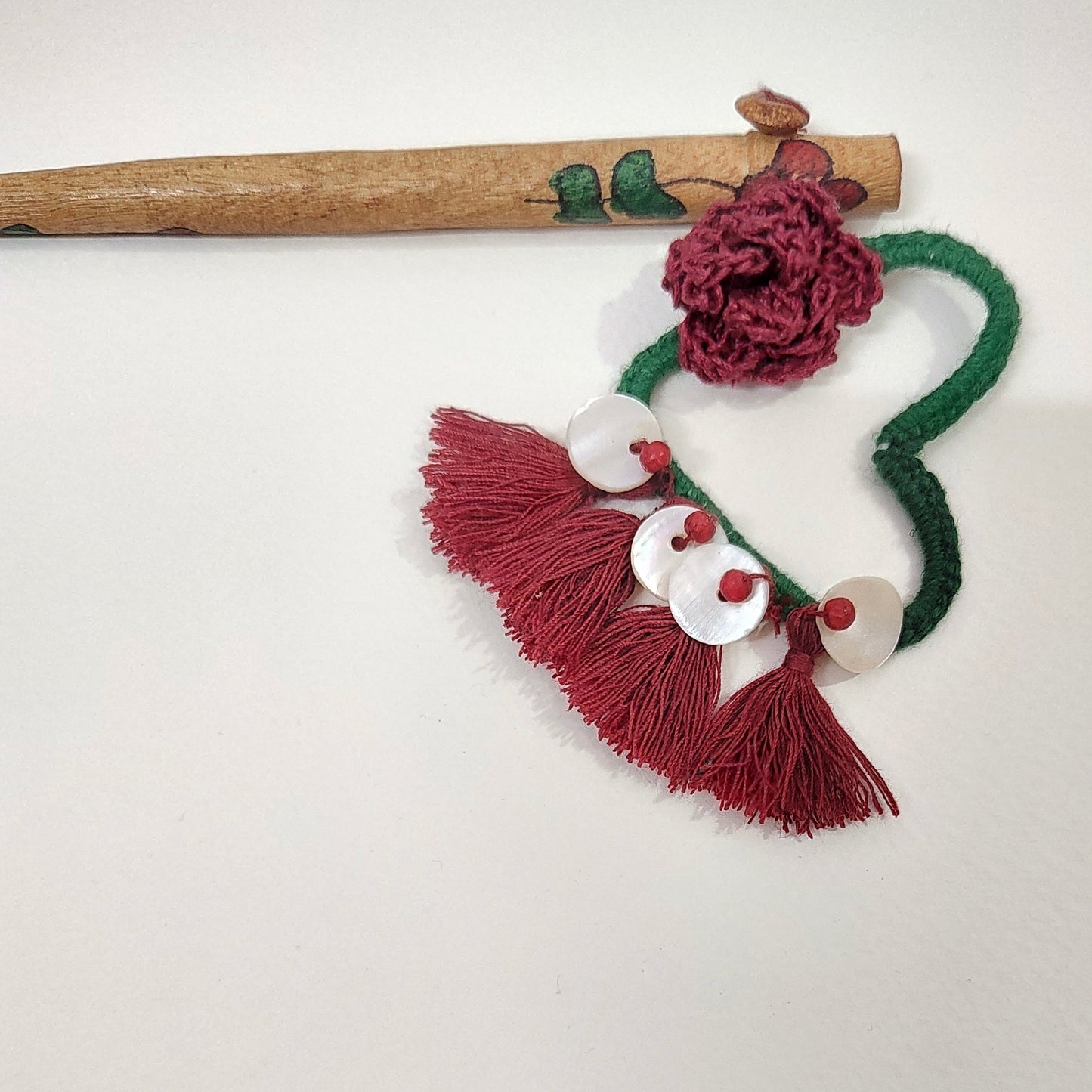 Wooden Hair Stick Rosy Red And Green at Kamakhyaa by Ikriit'm. This item is Accessories, Cotton Yarn, Green, Hair Accessory, Ikriit'm, Red, Wood