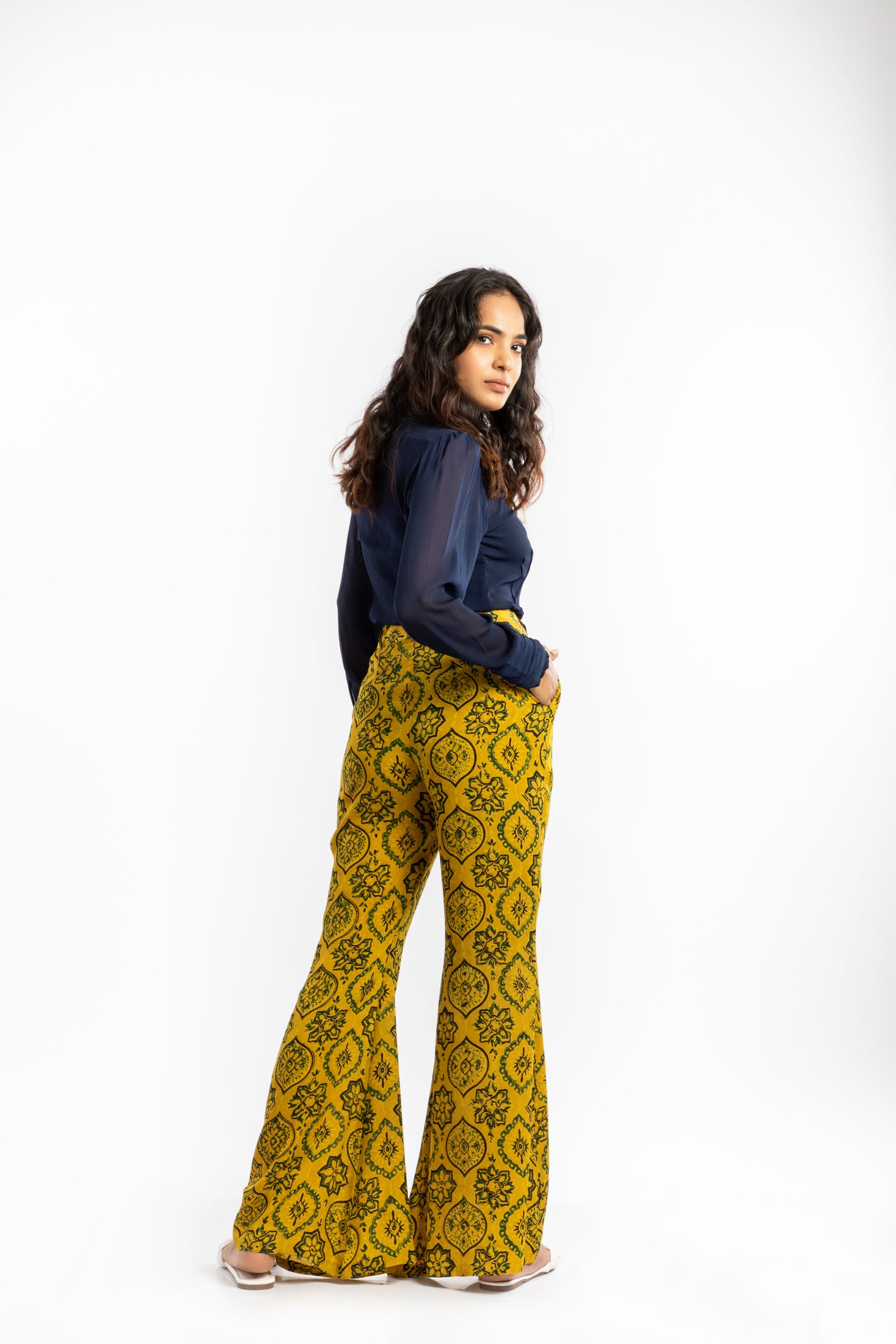 Yellow Bell Bottom Pant at Kamakhyaa by House Of Ara. This item is Ajrakh, Ajrakh Collection, Casual Wear, Cupro, Natural, Pants, Prints, Regular Fit, Womenswear, Yellow