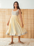 Yellow Embroidered Cotton Midi Dress at Kamakhyaa by Taro. This item is Best Selling, Cotton, Embroidered, Evening Wear, July Sale, July Sale 2023, Midi Dresses, Mulmul, Natural, Regular Fit, Rozana Taro, Sleeveless Dresses, Womenswear, Yellow