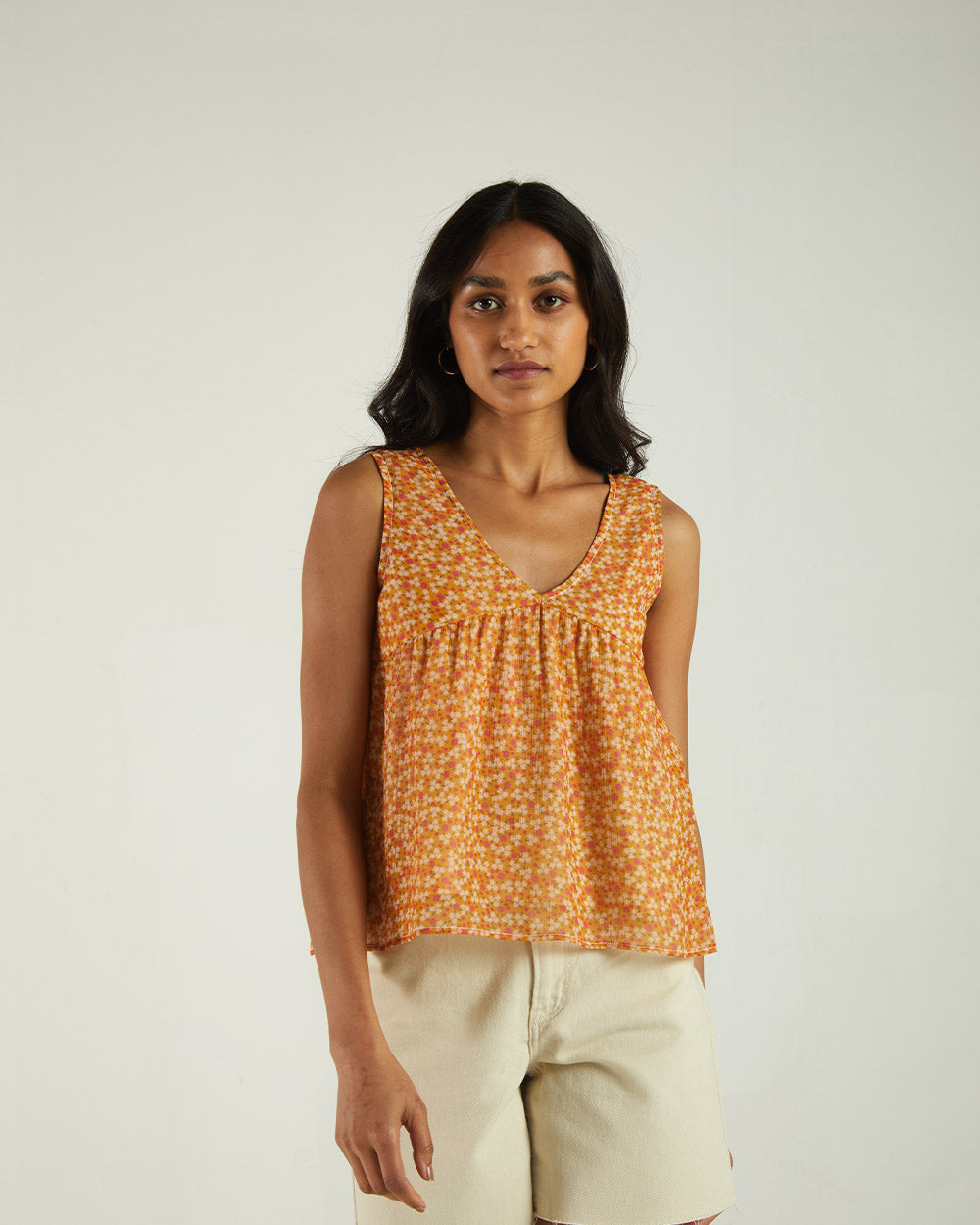 Yellow Floral Sleeveless Crop Top at Kamakhyaa by Reistor. This item is Bemberg, Casual Wear, Chiffon, Crop Tops, Natural, Prints, Tops, Womenswear, Yellow