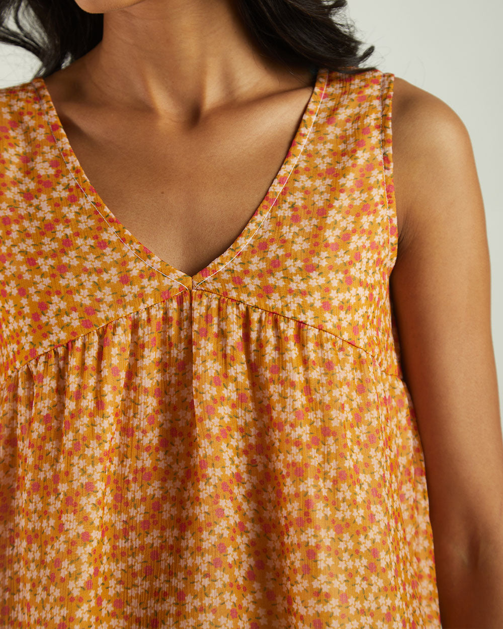 Yellow Floral Sleeveless Crop Top at Kamakhyaa by Reistor. This item is Bemberg, Casual Wear, Chiffon, Crop Tops, Natural, Prints, Tops, Womenswear, Yellow